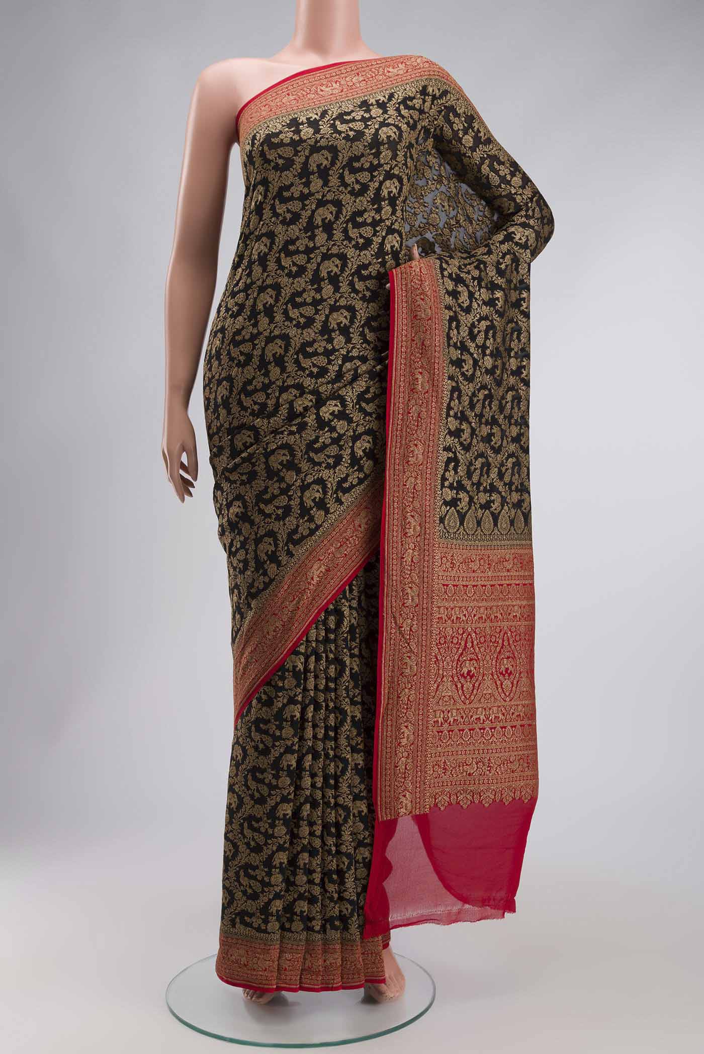 Black Banarasi Georgette Saree with Zari Brocade on the body and Zari Border displayed on a mannequin