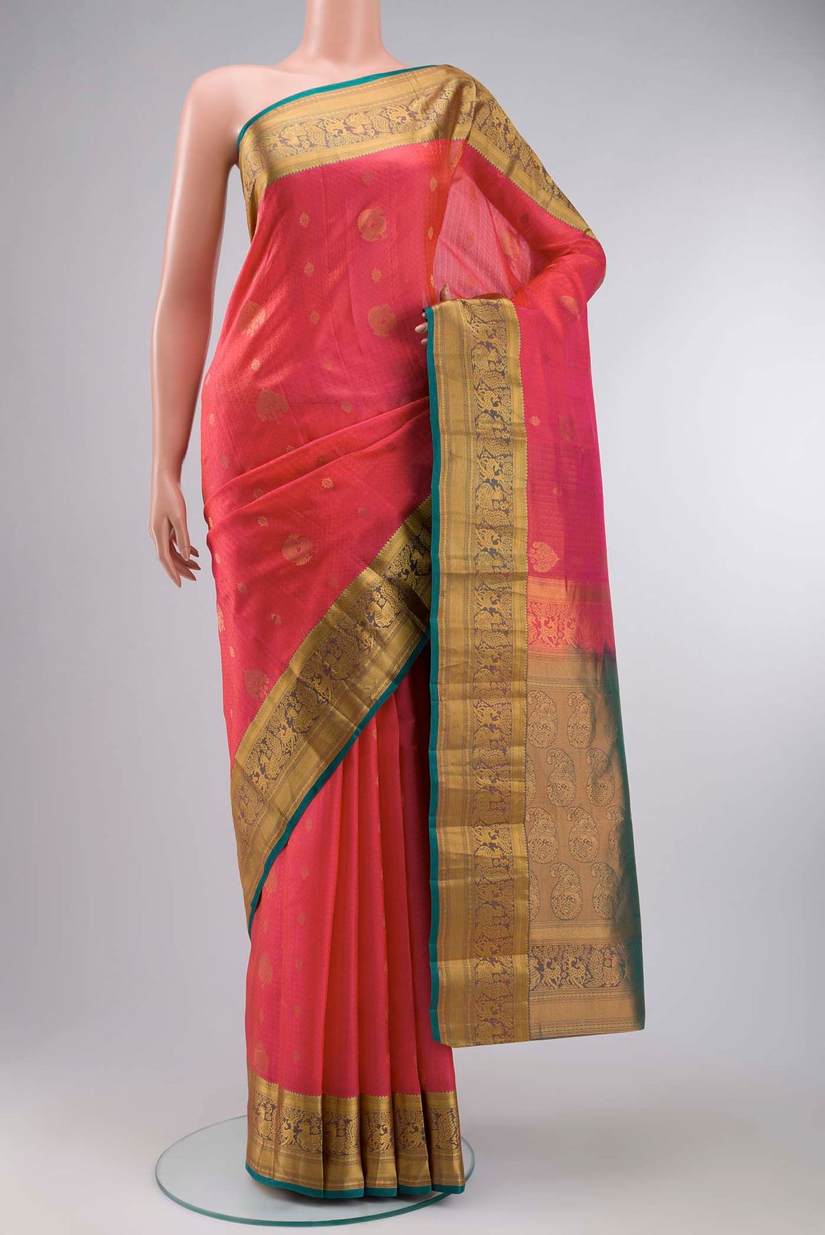 Pink with Orange Color Kanchipuram Silk Saree with Jacquard With Zari Butta on the body and Zari Border displayed on a mannequin