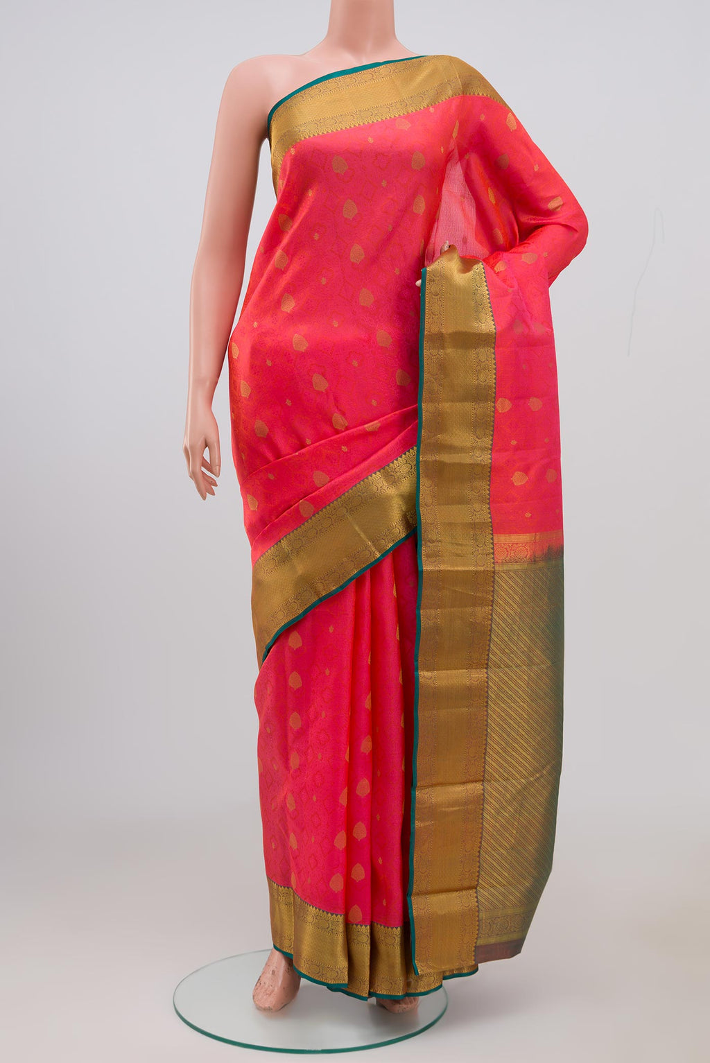 Pink Kanchipuram Saree with Jacquard With Zari Butta on the body and Zari Border.  displayed on a mannequin
