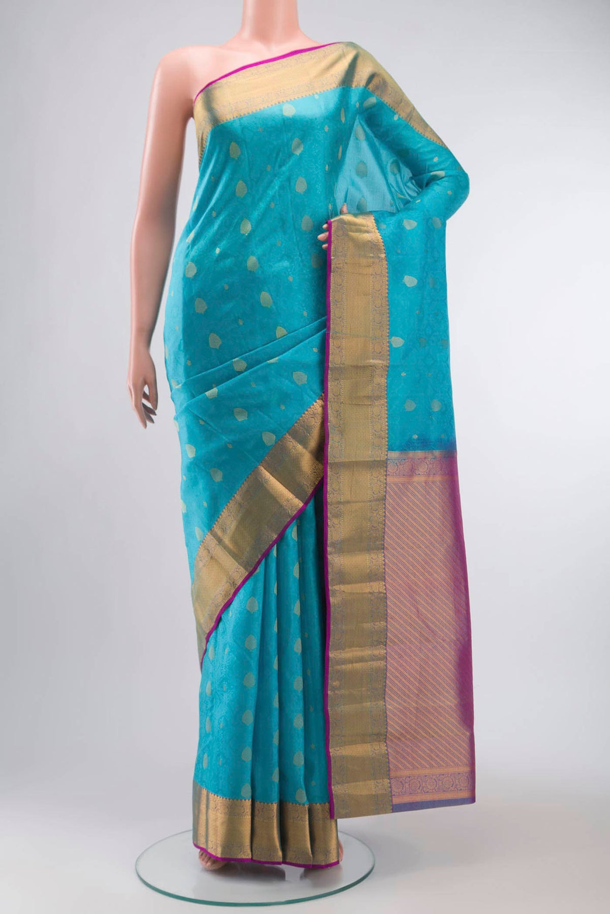 Blue Kanchipuram Silk Saree with Jacquard With Zari Butta on the body and Zari Border displayed on a mannequin