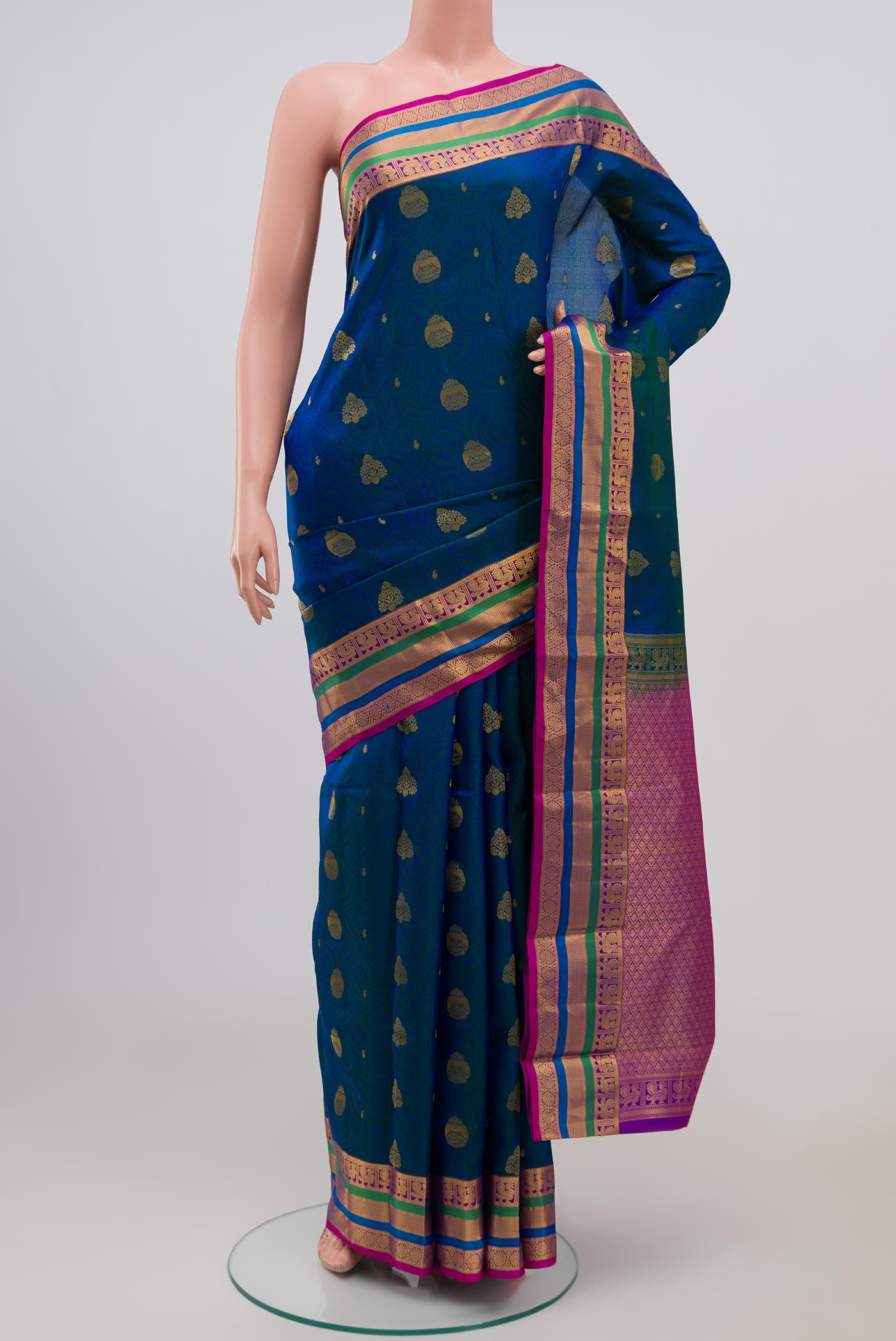 Blue Kanchipuram Silk Saree with Jacquard With Zari Butta on the body and Zari Border.  displayed on a mannequin