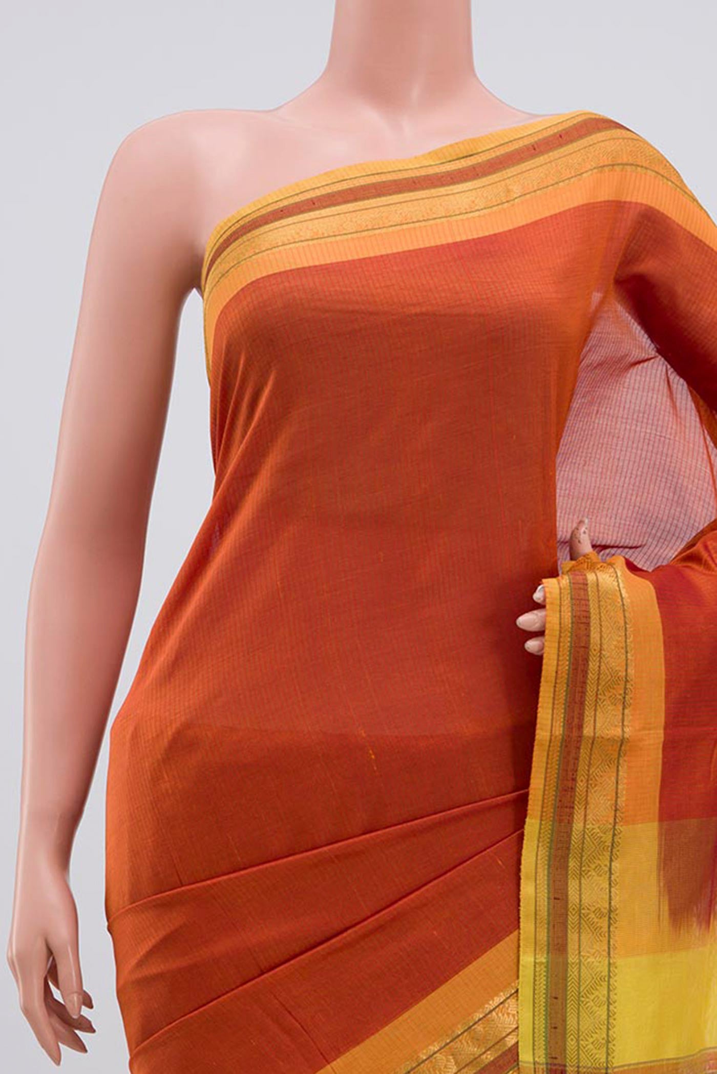 Border image of Orange Coimbatore Silk Cotton Saree with Plain Body and Zari Border. 
