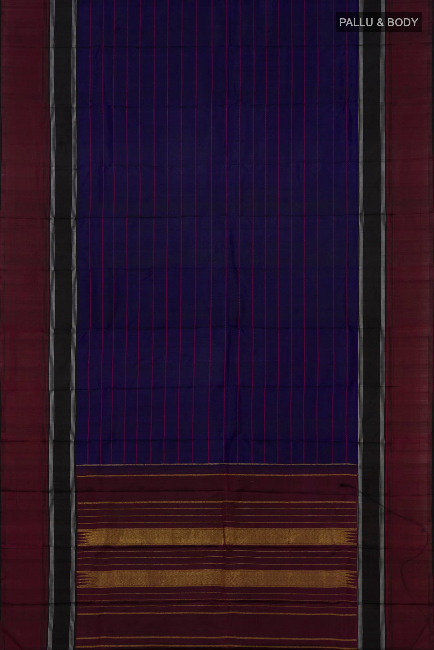 Flat view of Navy Blue Kanjivaram Silk Saree with Veldhari on the body and Plain Border. 