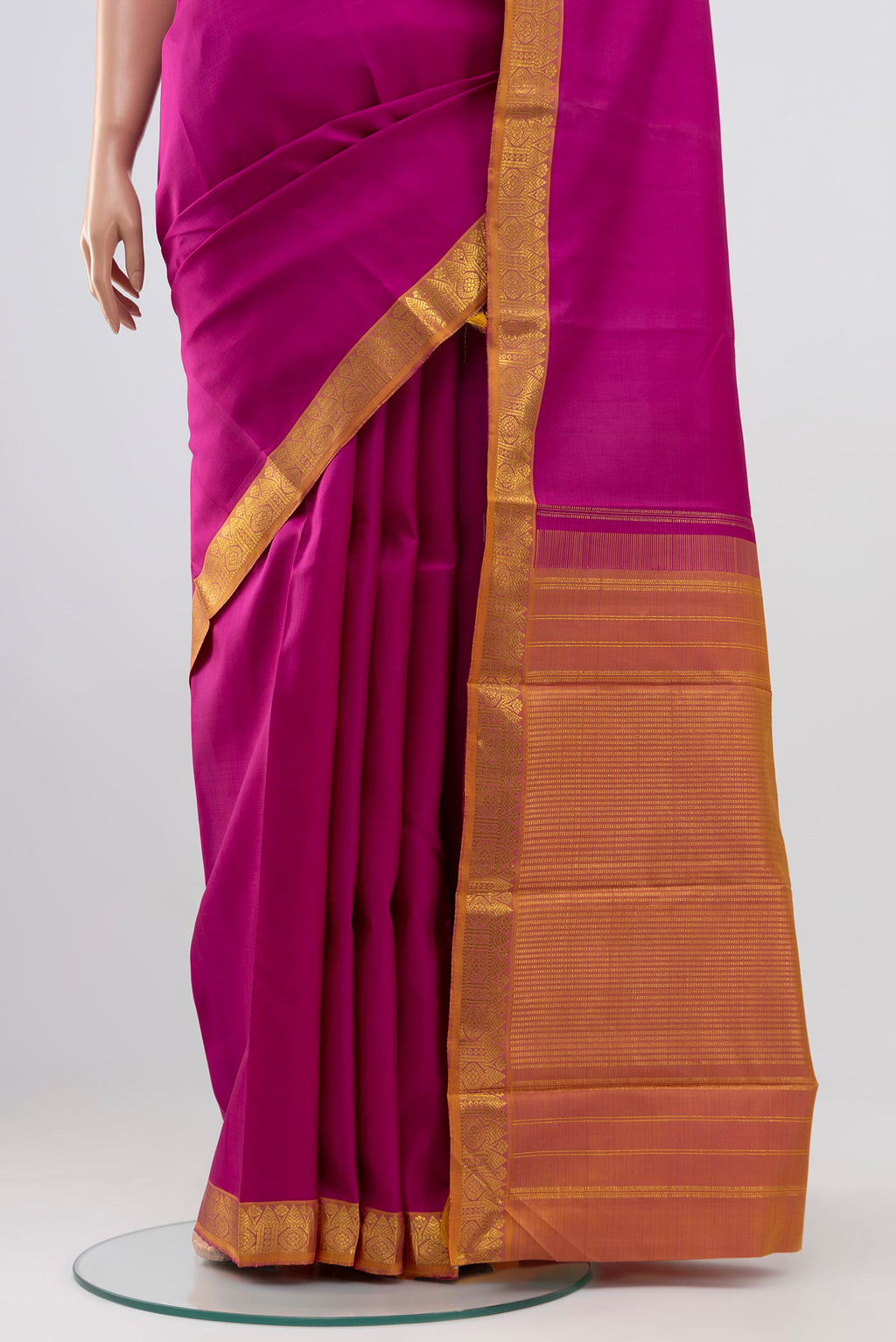 Pleats and pallu of Pure Silk Pure Zari Pink Kanjivaram Saree with Plain Body and Zari Border. 