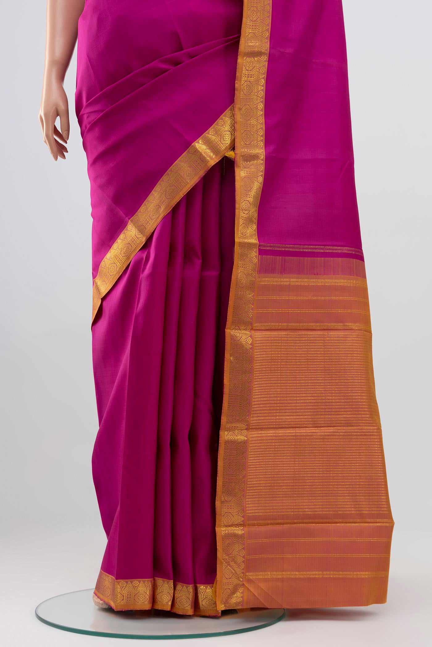 Pleats and pallu of Pure Silk Pure Zari Pink Kanjivaram Saree with Plain Body and Zari Border. 