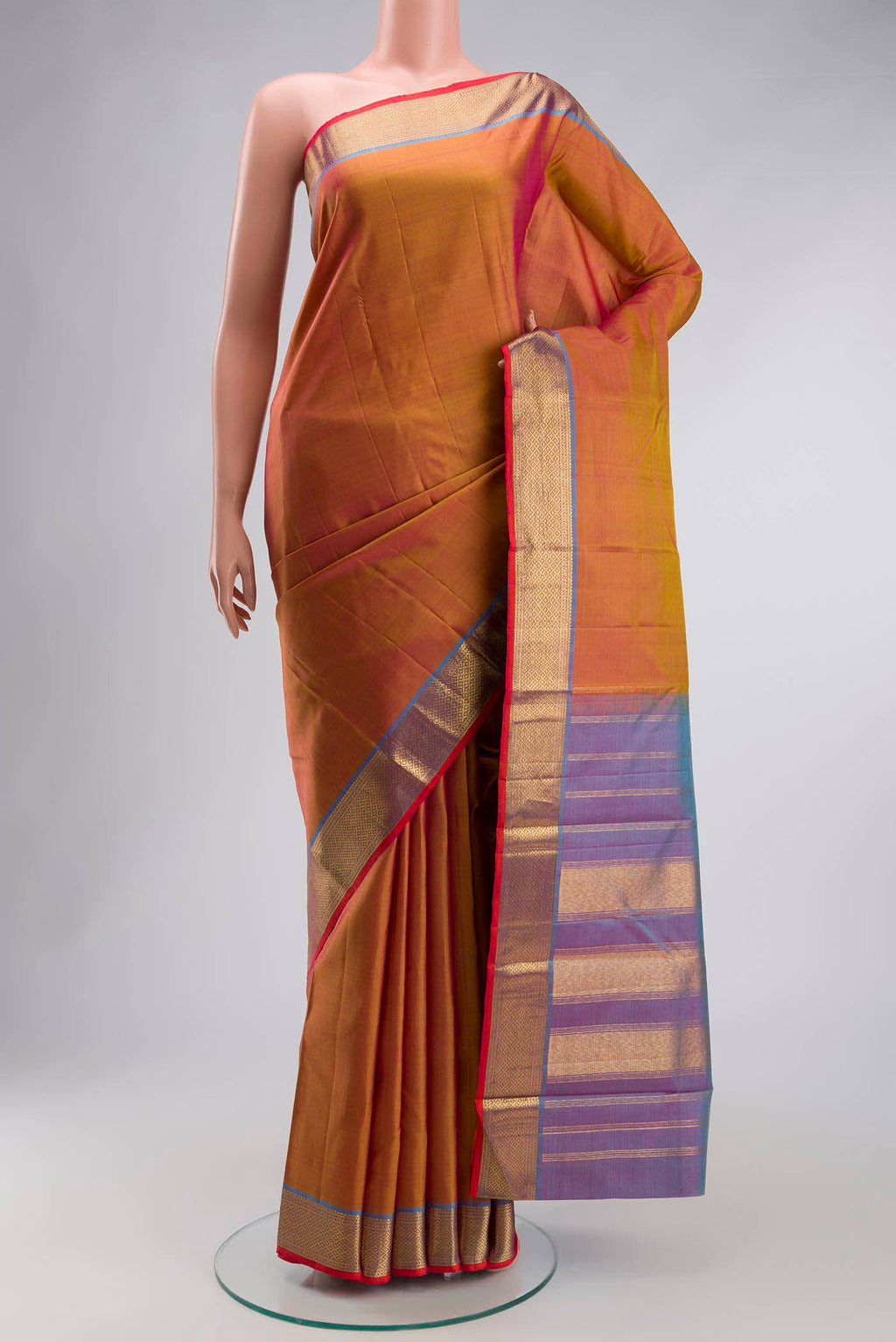 Mustard with Pink Color Kanchipuram Silk Saree with Plain Body and Zari Border displayed on a mannequin