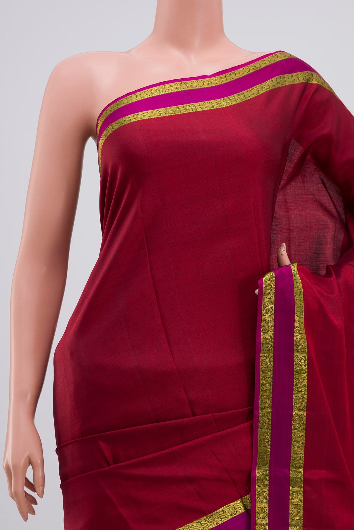 Border image of Pure Silk Pure Zari Maroon Kanchipuram Saree with Plain Body and Zari Border. 