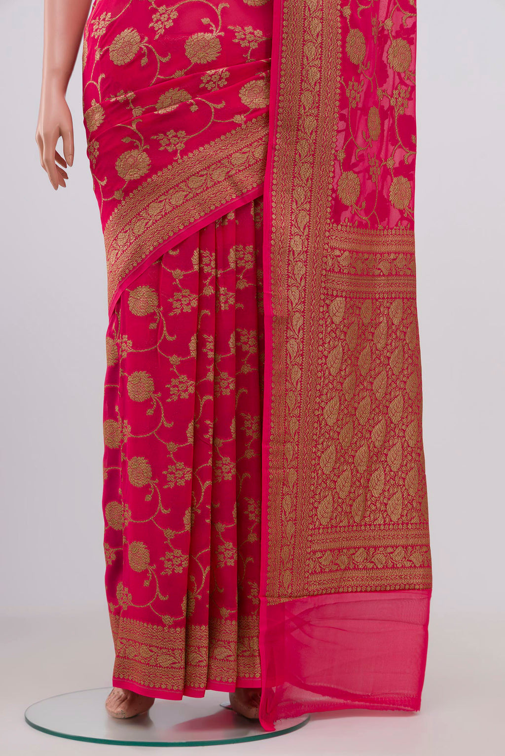Pleats and pallu of Pink Banarasi Georgette Saree with Fancy on the body and Zari Border. 