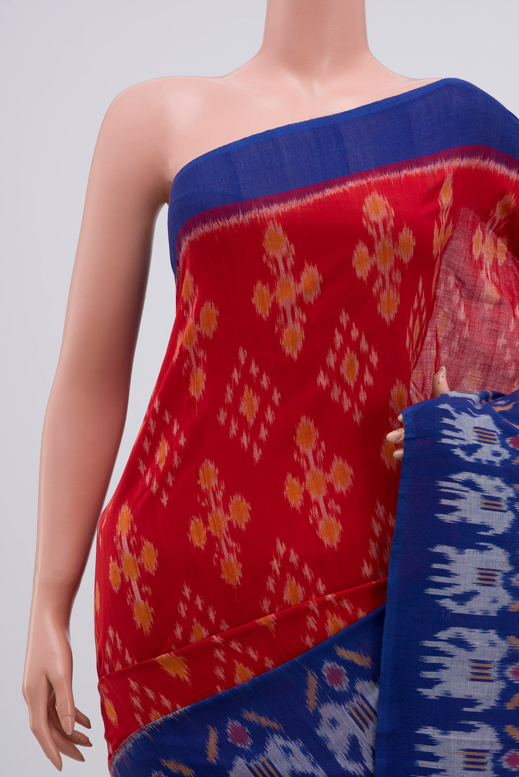 Border image of Red Pochampally Cotton Saree with Ikat design on the body and Ikat Border. 