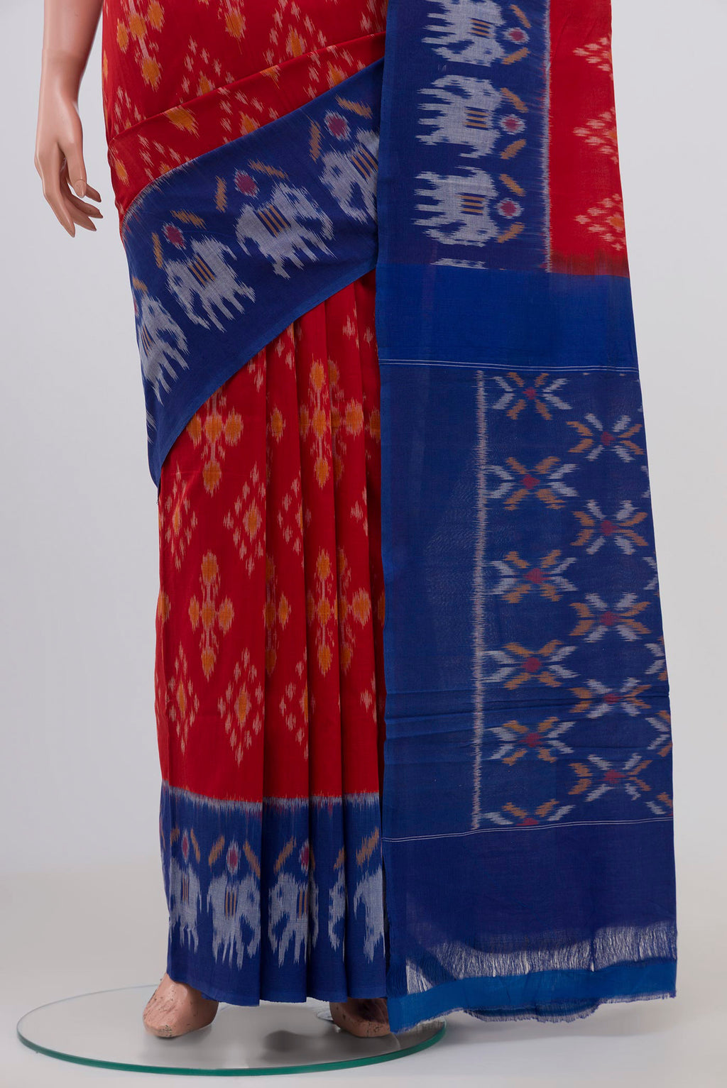 Pleats and pallu of Red Pochampally Cotton Saree with Ikat design on the body and Ikat Border. 