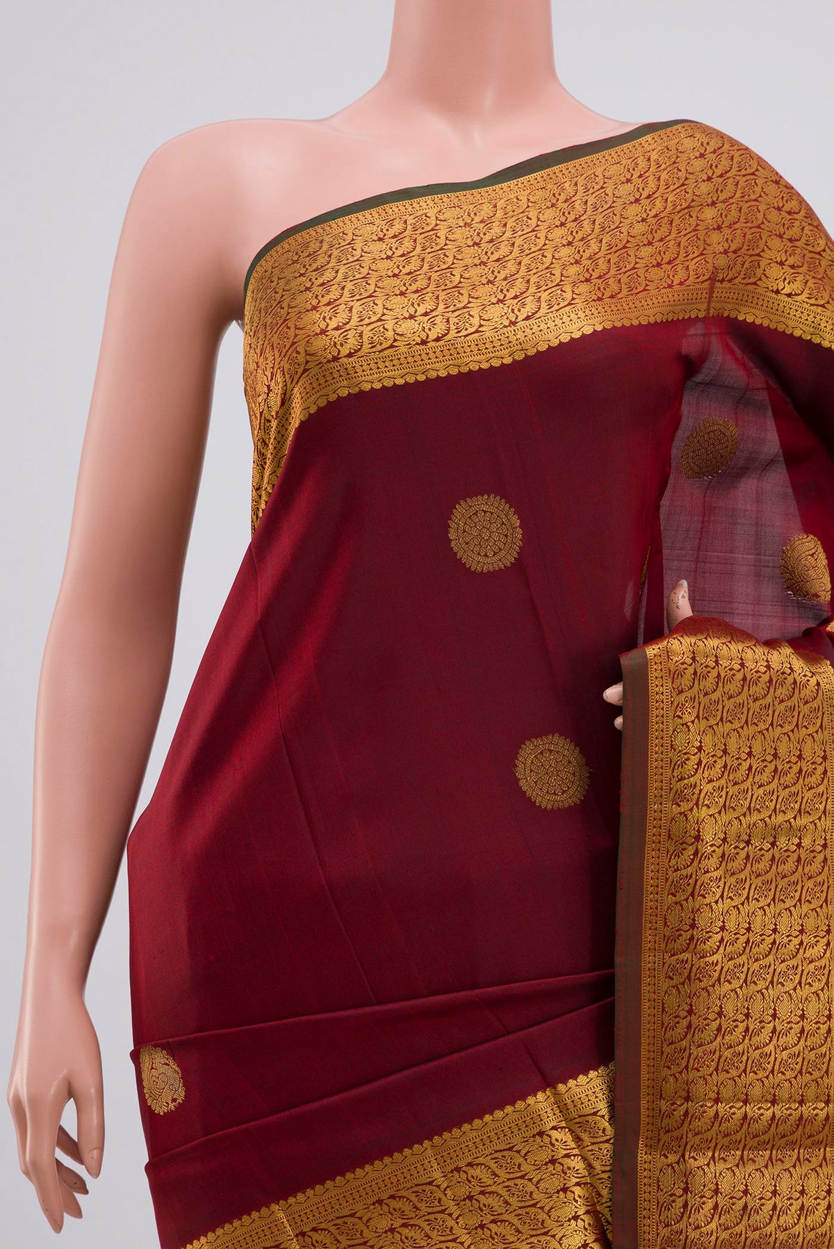 Border image of Pure Silk Pure Zari Maroon Kanchipuram Saree with Zari Butta on the body and Zari Border. 