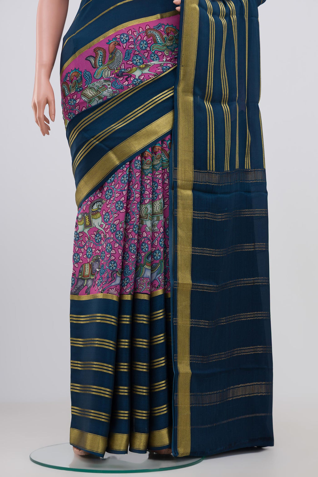 Pleats and pallu of Pink Crepe Saree with Printed design on the body and Zari Border. 