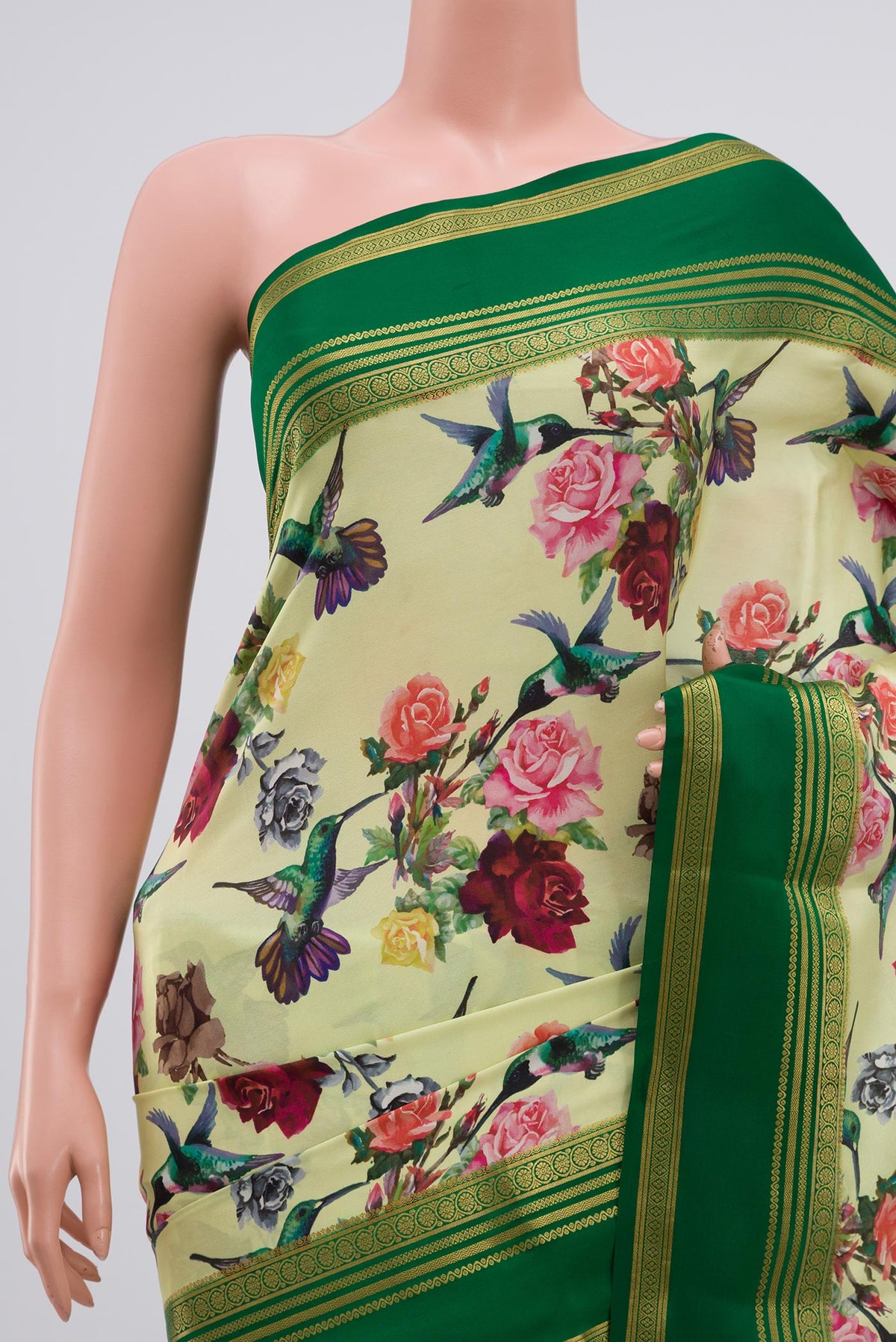 Border image of Light Green Crepe Saree with Printed design on the body and Zari Border. 