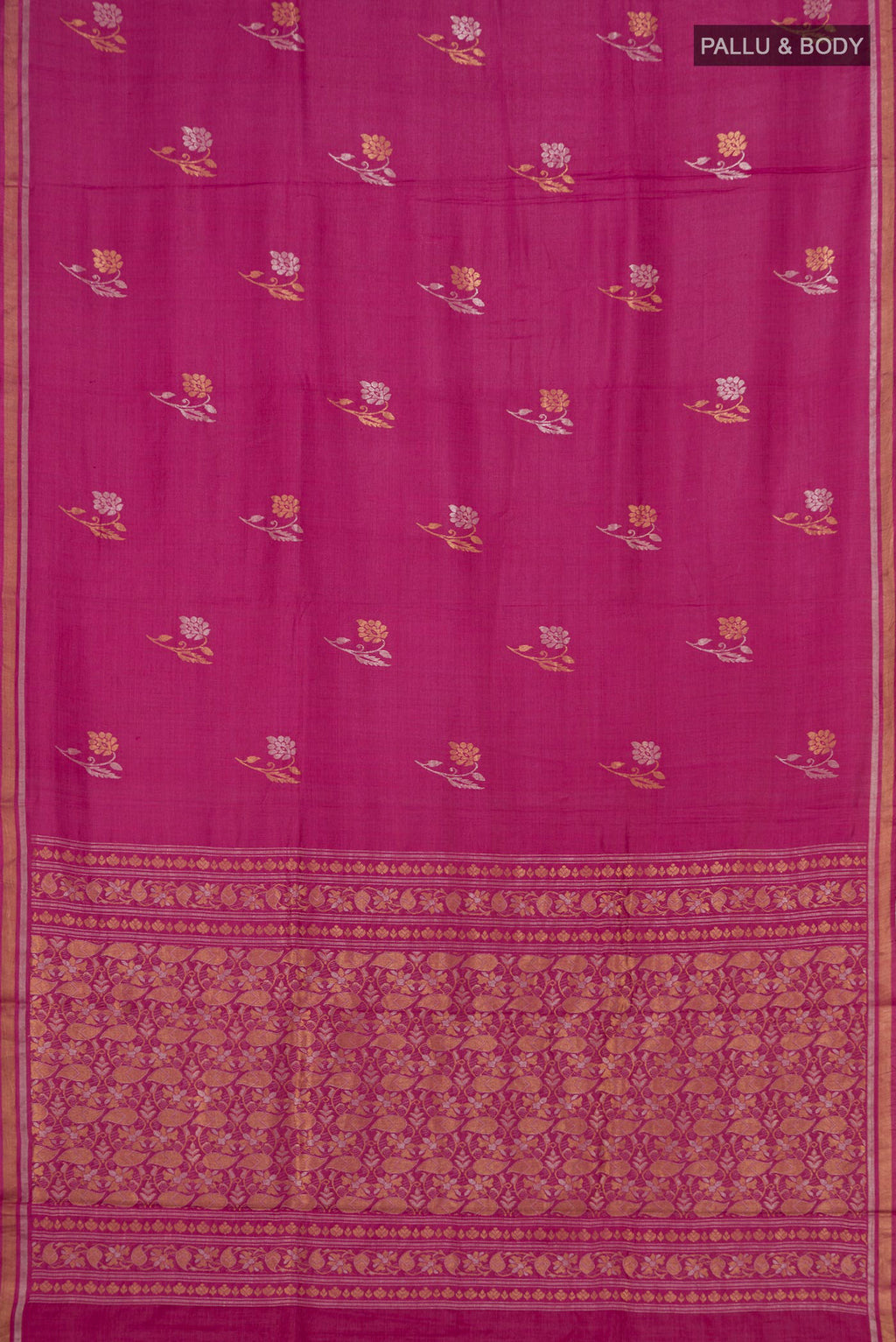 Flat view of Pink Tussar Saree with Zari Butta on the body and Thin Zari Line. 