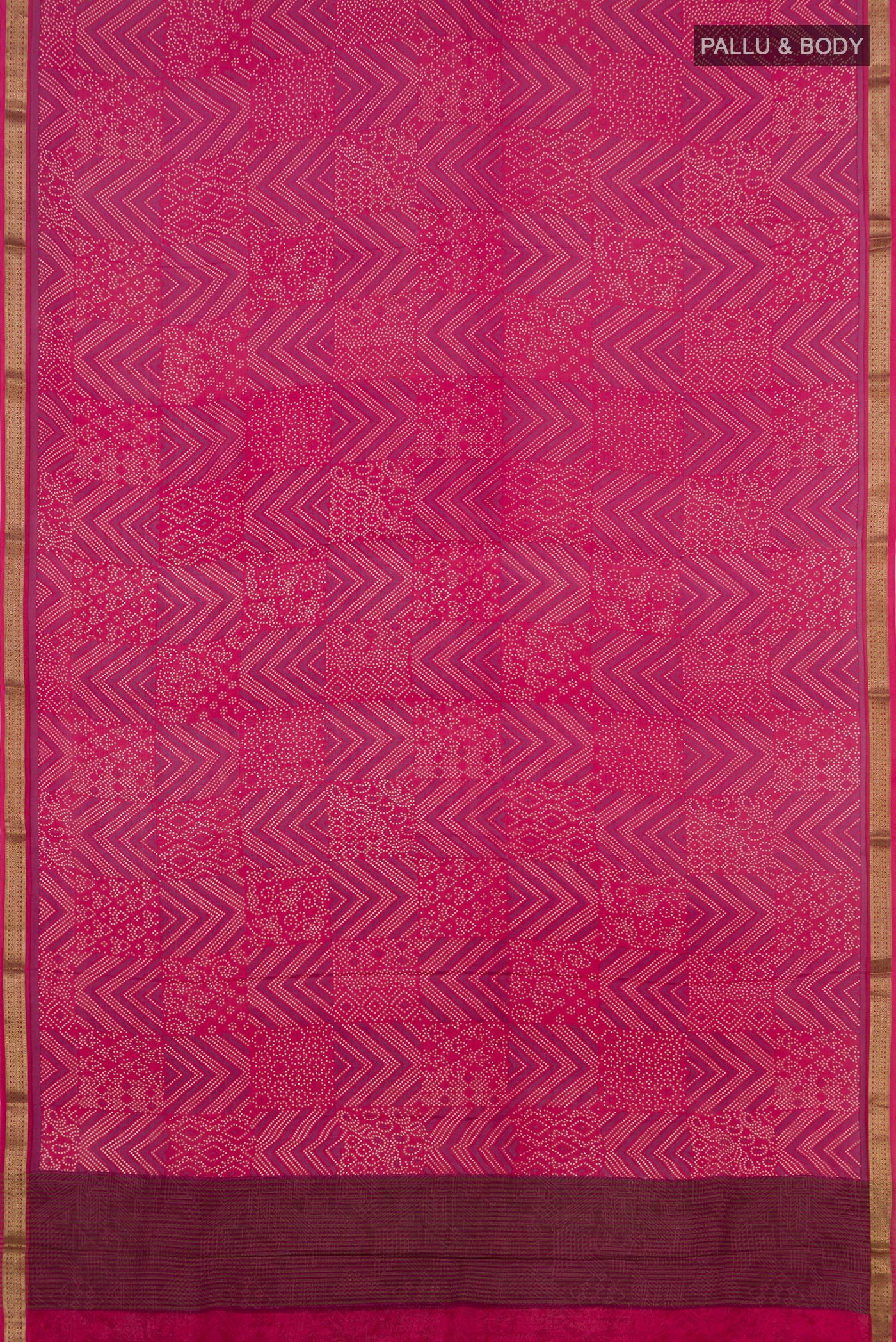 Flat view of Pink Crepe Saree with Printed design on the body and Zari Border. 