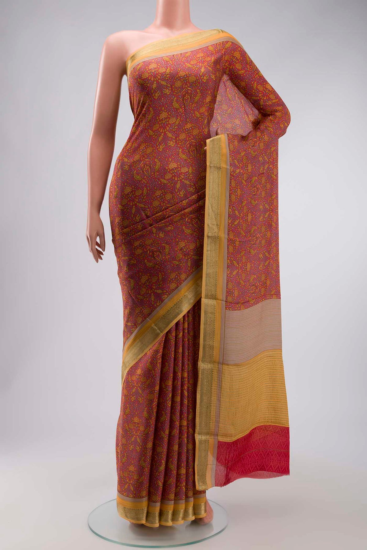Pink Mysore Crepe Saree with Printed design on the body and Zari Border displayed on a mannequin