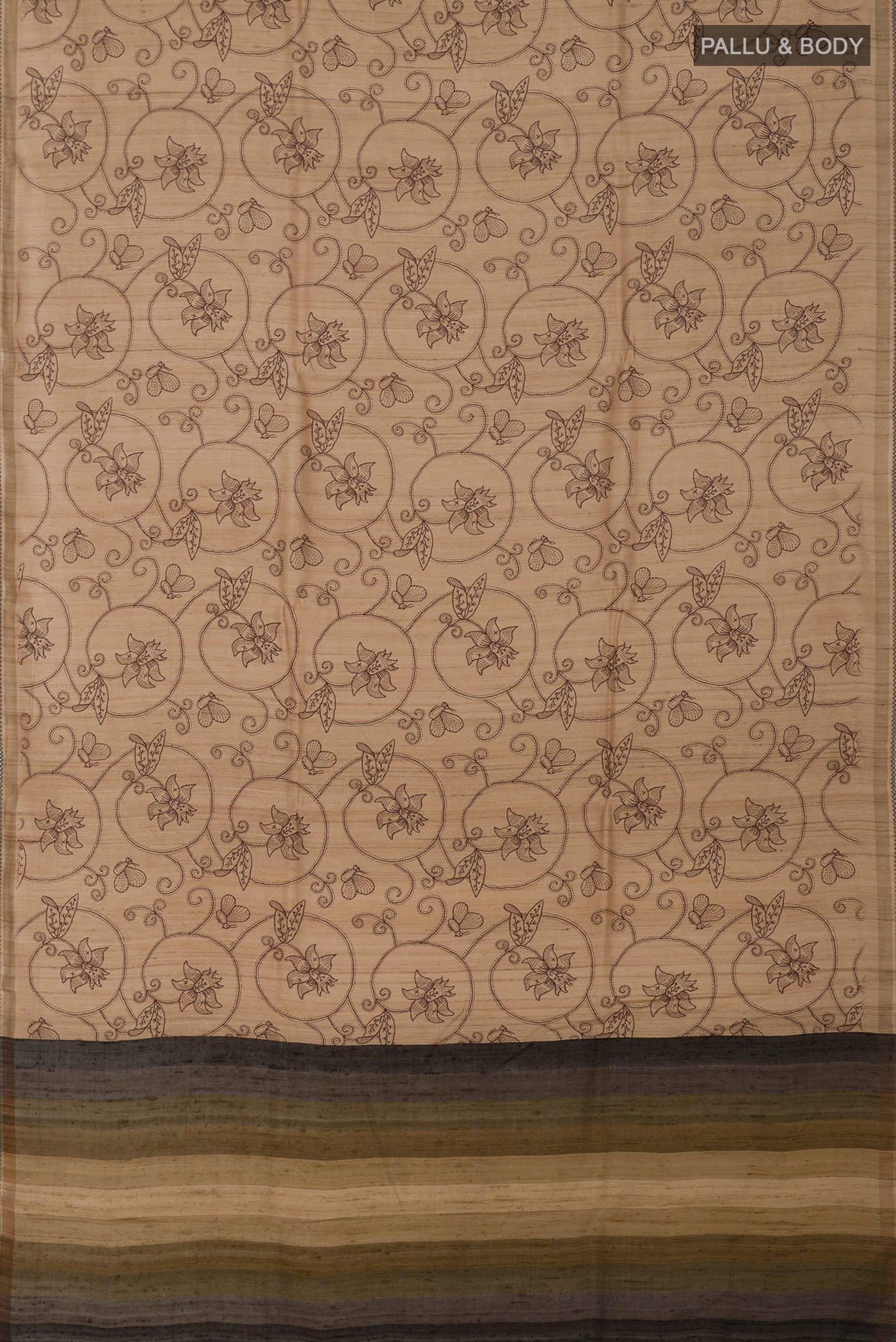 Flat view of Cream Tussar Silk Saree with Fancy on the body and Plain Border. 
