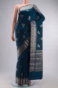 Blue Banarasi Raw Silk Saree with Zari Butta on the body and Zari Border displayed on a mannequin