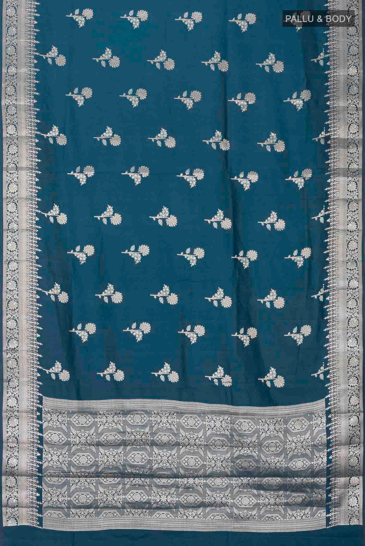 Flat view of Blue Banarasi Raw Silk Saree with Zari Butta on the body and Zari Border