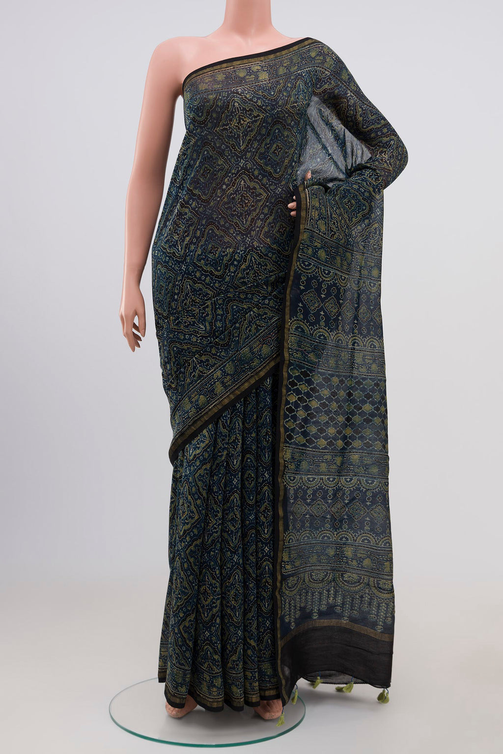 Indigo Chanderi Silk Cotton Saree with Printed design on the body and Thin Zari Line.  displayed on a mannequin
