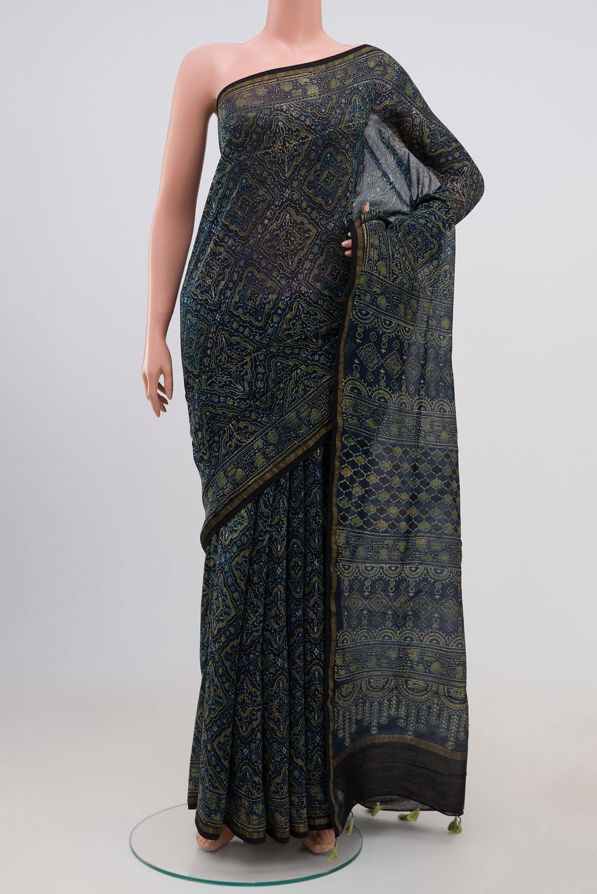 Indigo Chanderi Silk Cotton Saree with Printed design on the body and Thin Zari Line.  displayed on a mannequin