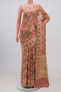 Peach Banarasi Georgette Saree with Fancy on the body and Thread Border.  displayed on a mannequin