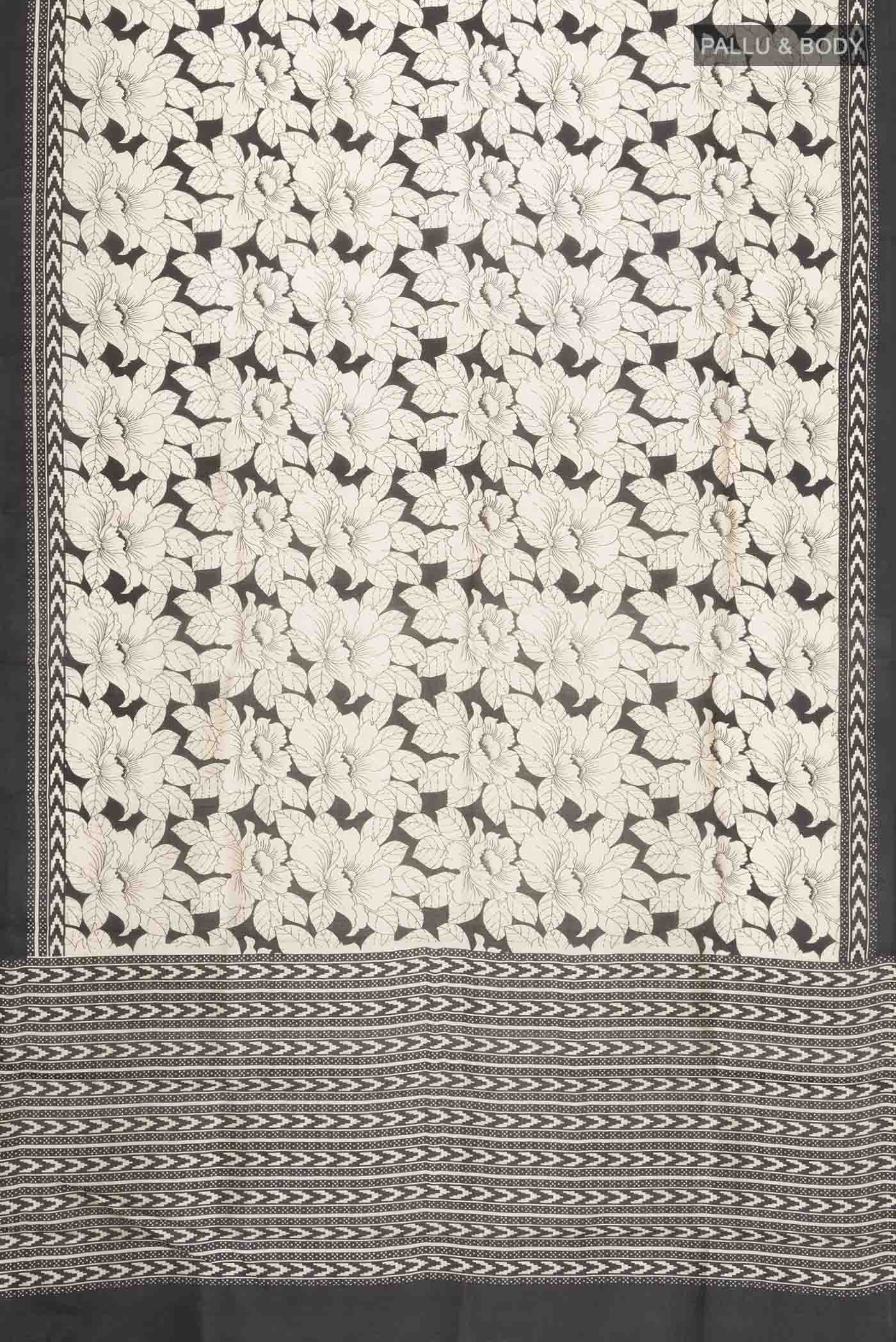 Flat view of Cream Printed Silk Saree with Printed design on the body and Plain Border