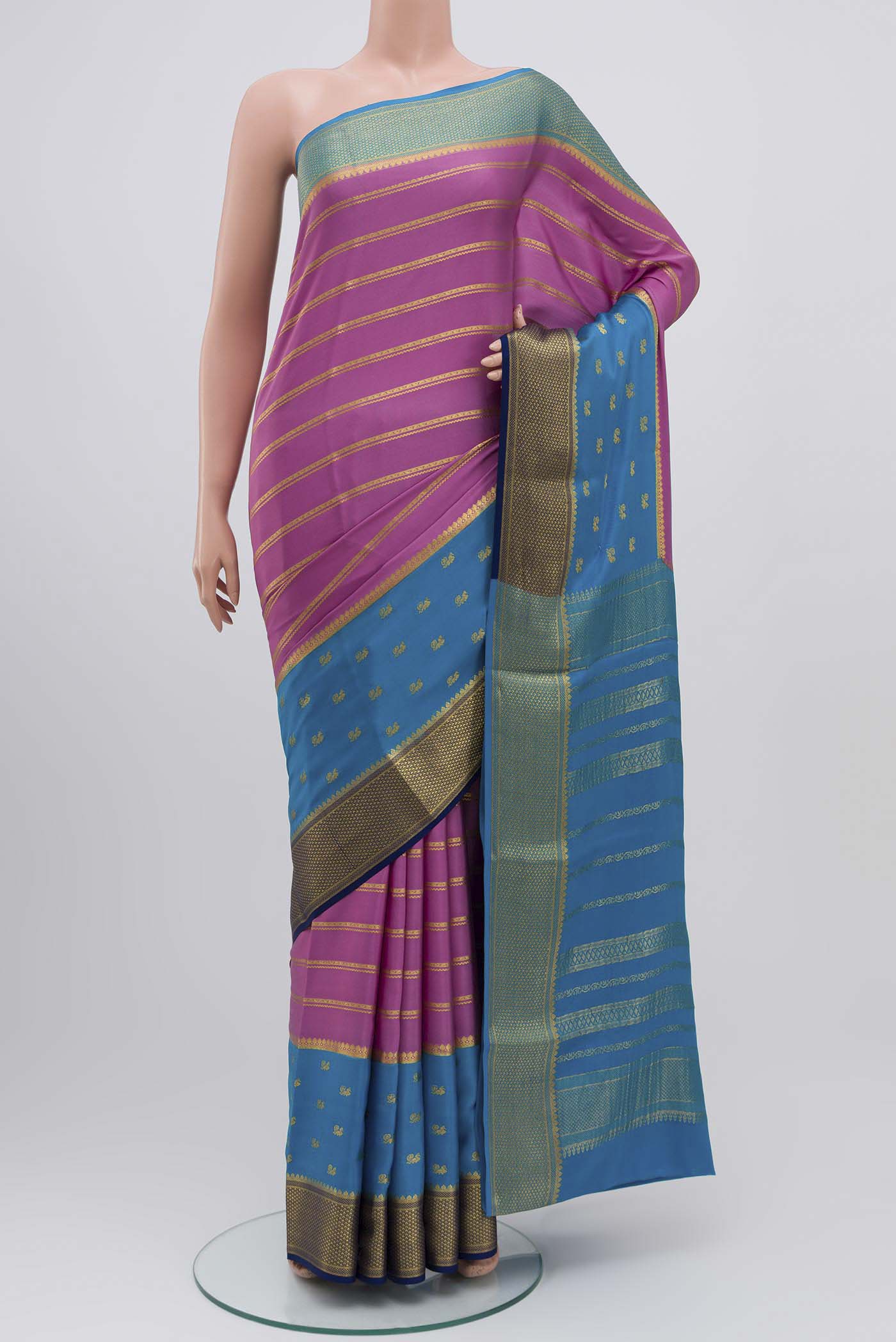 Lavender Mysore Crepe Saree with Stripes on the body and Zari Border displayed on a mannequin