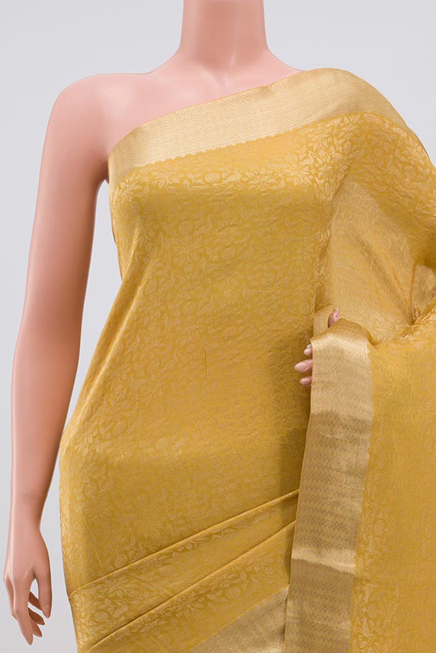 Border image of Yellow Mysore Silk Saree with Zari Brocade on the body and Zari Border. 