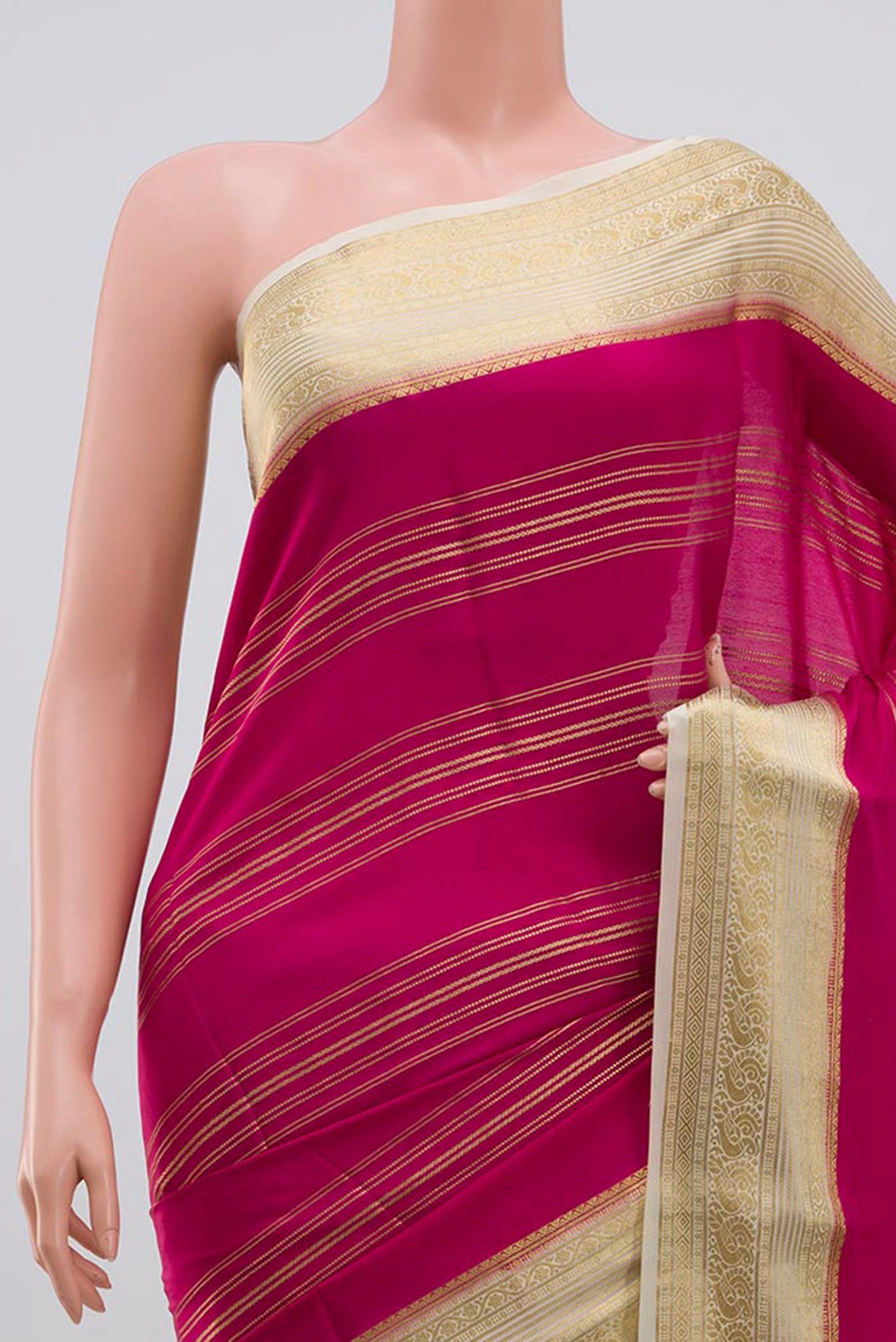 Border image of Magenta Mysore Silk Saree with Stripes on the body and Zari Border. 