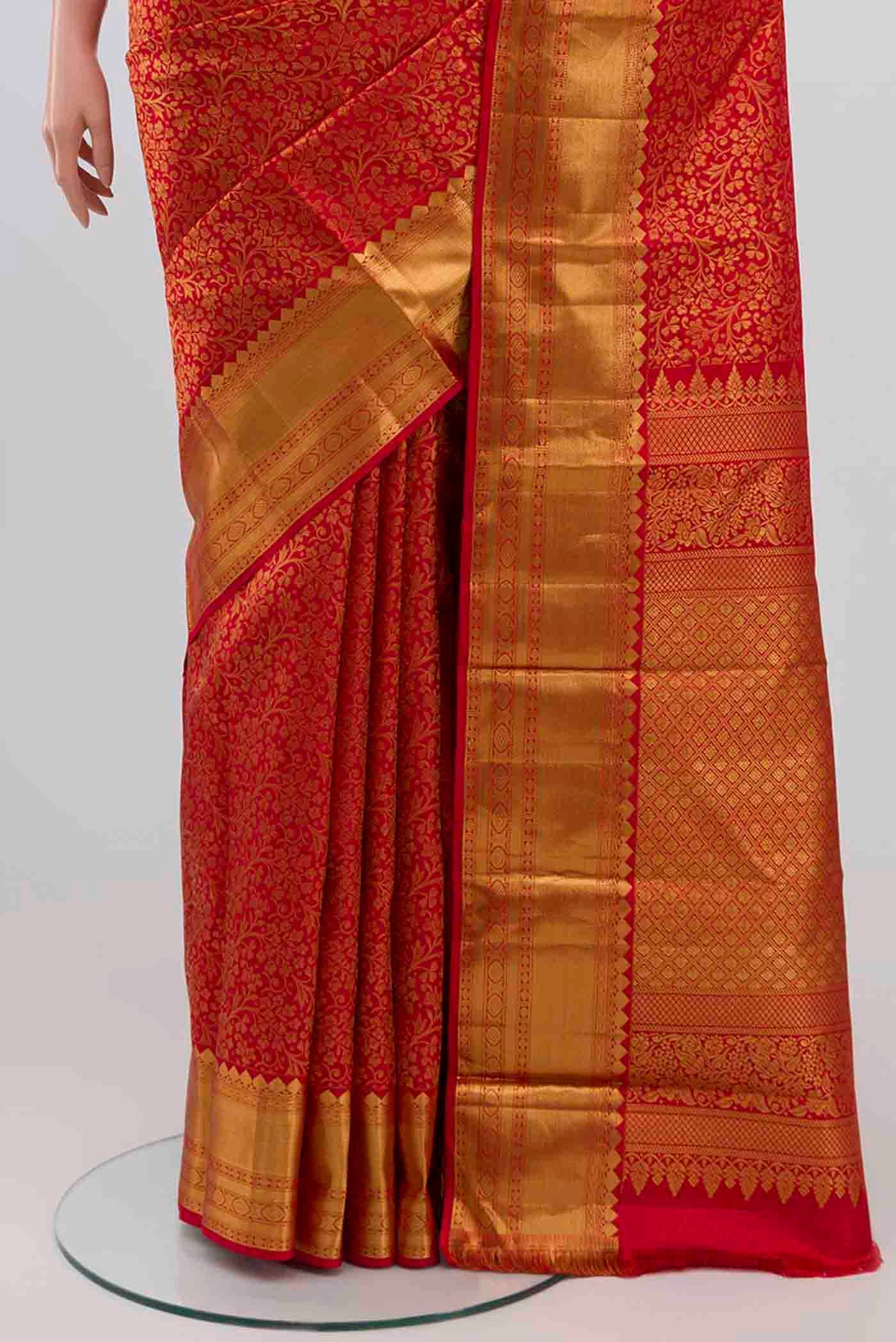 Pleats and pallu of Red Kanjivaram Silk Saree with Zari Brocade on the body and Zari Border. 