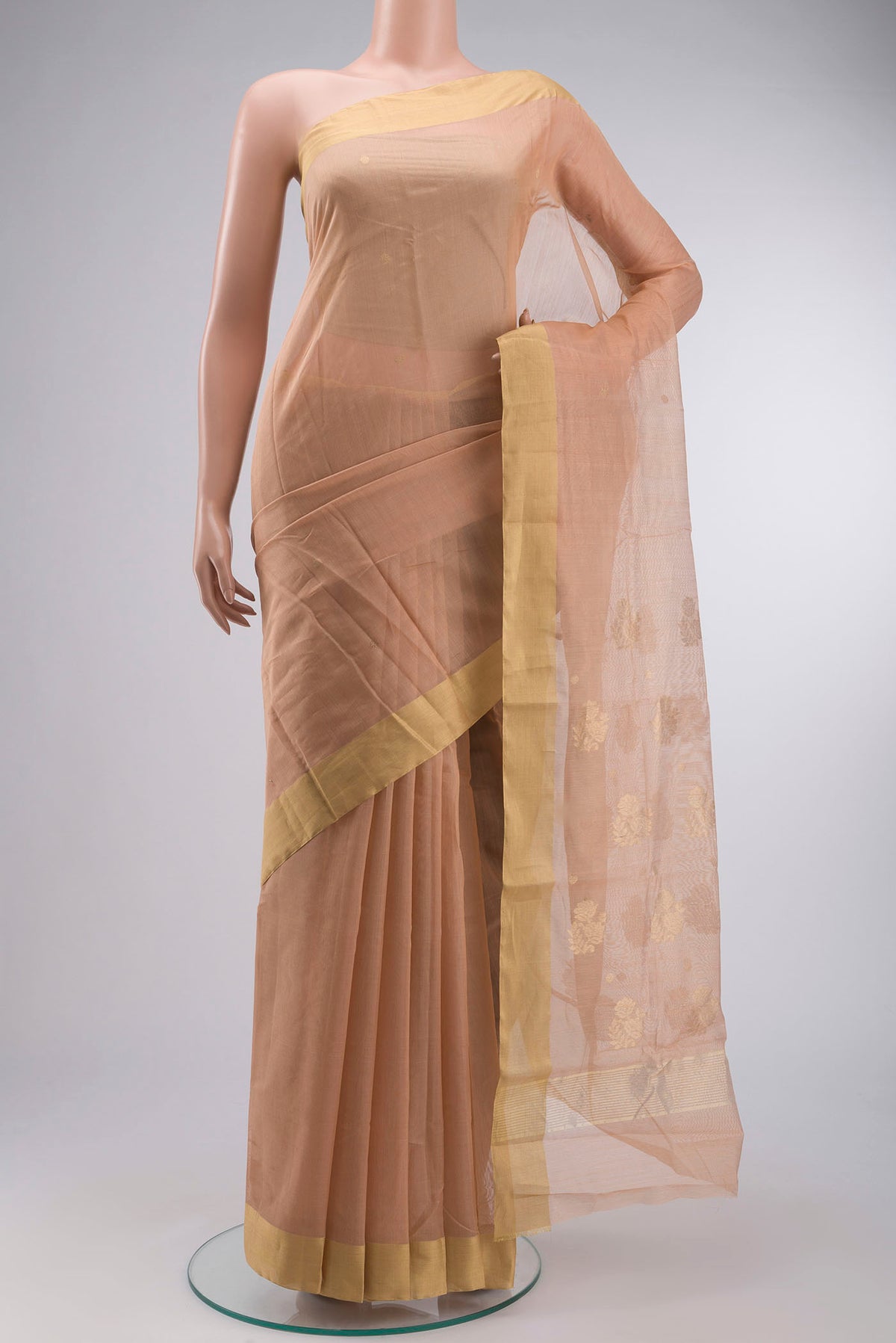 Peach Chanderi Silk Cotton Saree with Zari Butta on the body and Zari Border displayed on a mannequin