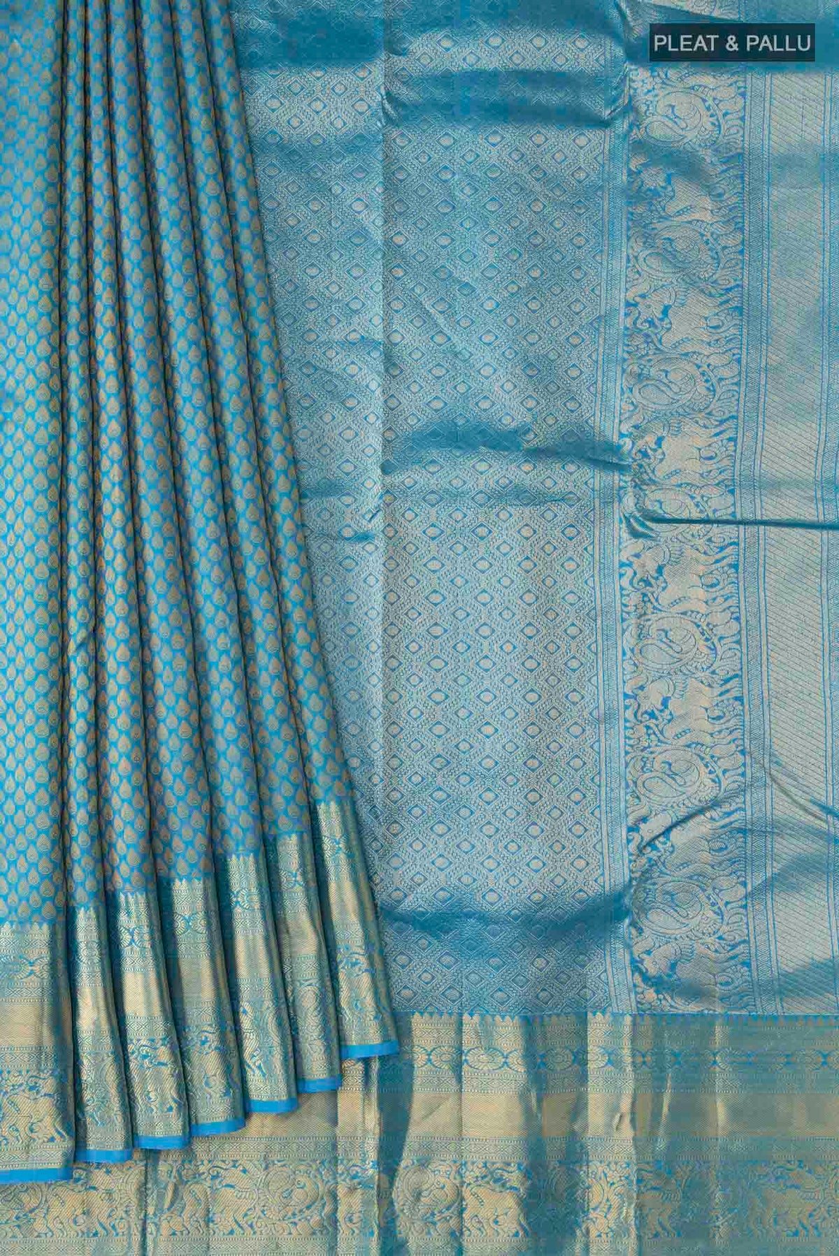 Pleats and pallu of Blue Kanchipuram Silk Saree with Jacquard design on the body and Zari Border