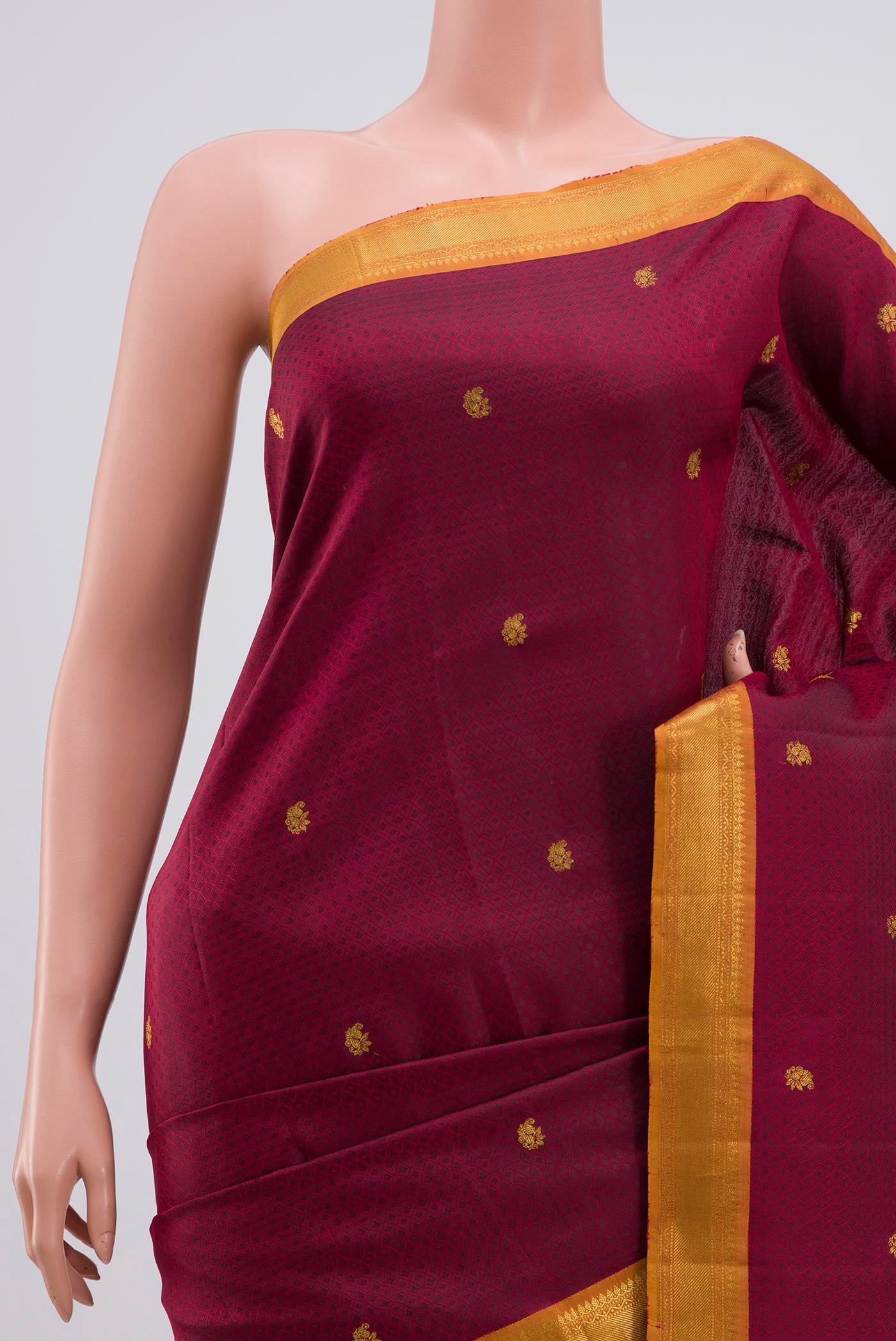 Border image of Maroon Kanchipuram Saree with Jacquard With Zari Butta on the body and Zari Border. 