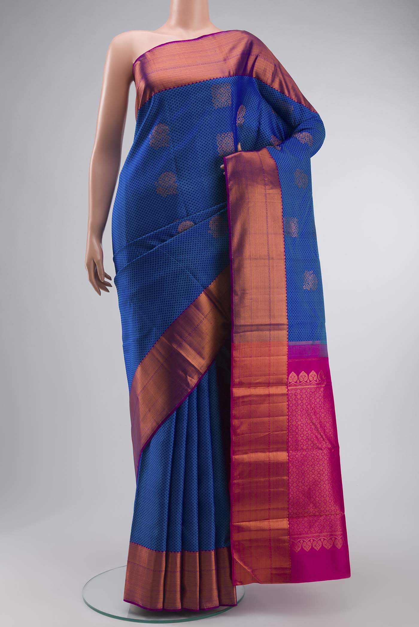 Blue Kanchipuram Silk Saree with Jacquard With Zari Butta on the body and Zari Border displayed on a mannequin