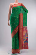 Green Blended Bangalore Silk Saree with Zari Butta on the body and Zari Border displayed on a mannequin