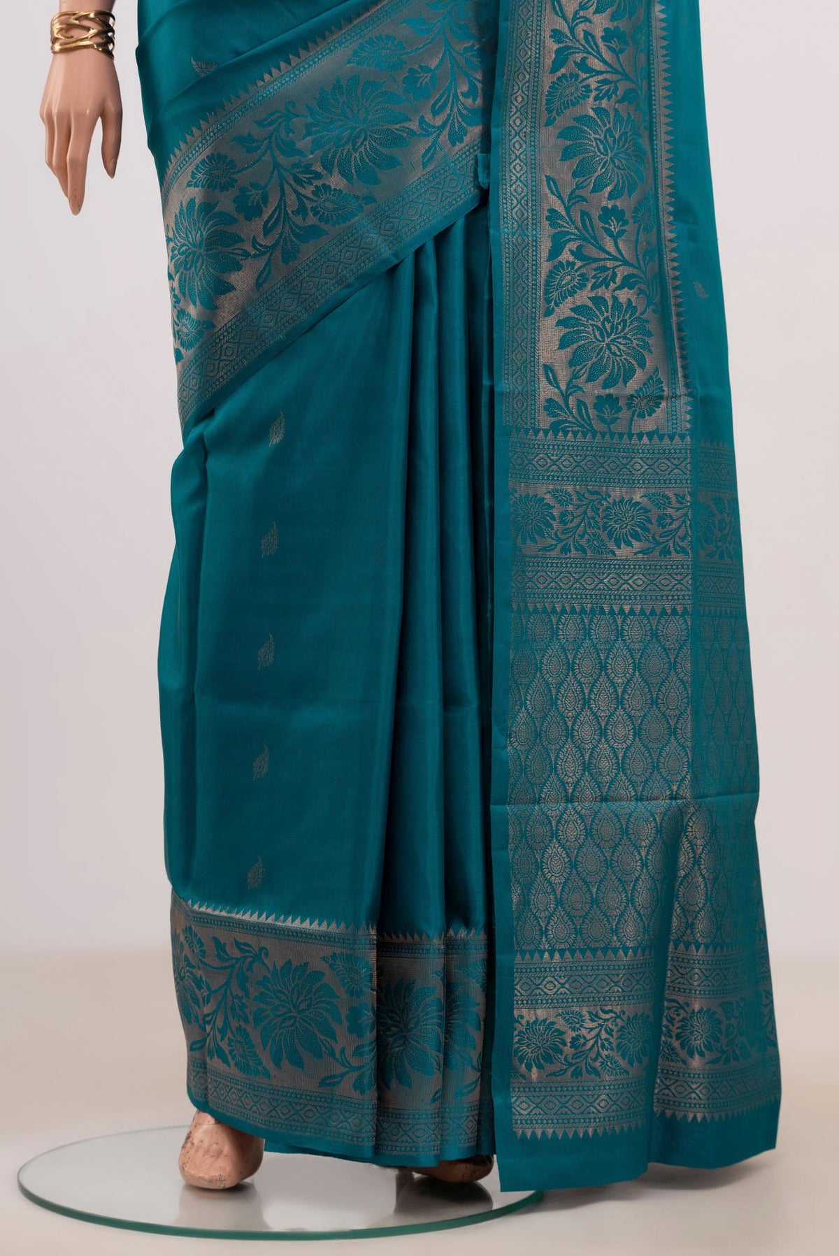 Pleats and pallu of Blue Soft Silk Saree with Zari Butta on the body and Fancy Border. 
