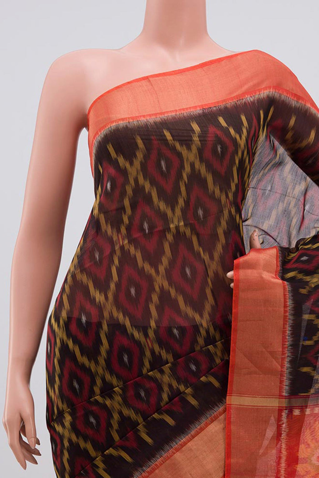 Border image of Black Coimbatore Silk Cotton Saree with Ikat Print on the body and Zari Border. 