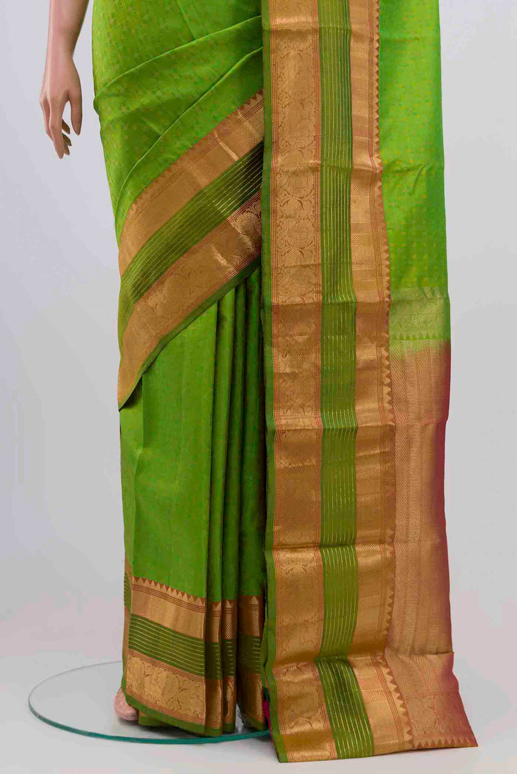 Pleats and pallu of Parrot Green Kanchipuram Silk Saree with Jacquard With Zari Butta on the body and Silk Border