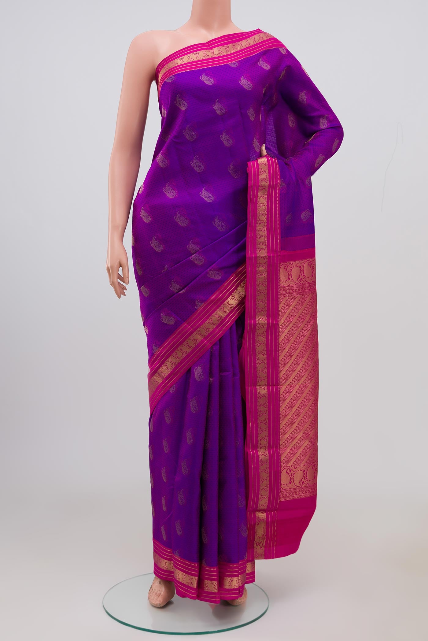 Purple Kanchipuram Saree with Jacquard With Zari Butta on the body and Zari Border.  displayed on a mannequin