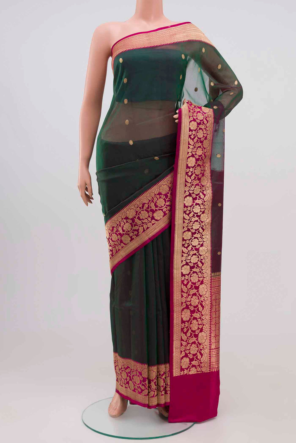 Green with Pink Color Banarasi Silk Saree with Zari Butta on the body and Zari Border.  displayed on a mannequin
