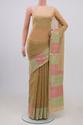 Golden Peach Coimbatore Silk Cotton Saree with Zari Butta on the body and Zari Border.  displayed on a mannequin