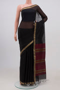 Black Coimbatore Silk Cotton Saree with Plain Body and Zari Border.  displayed on a mannequin