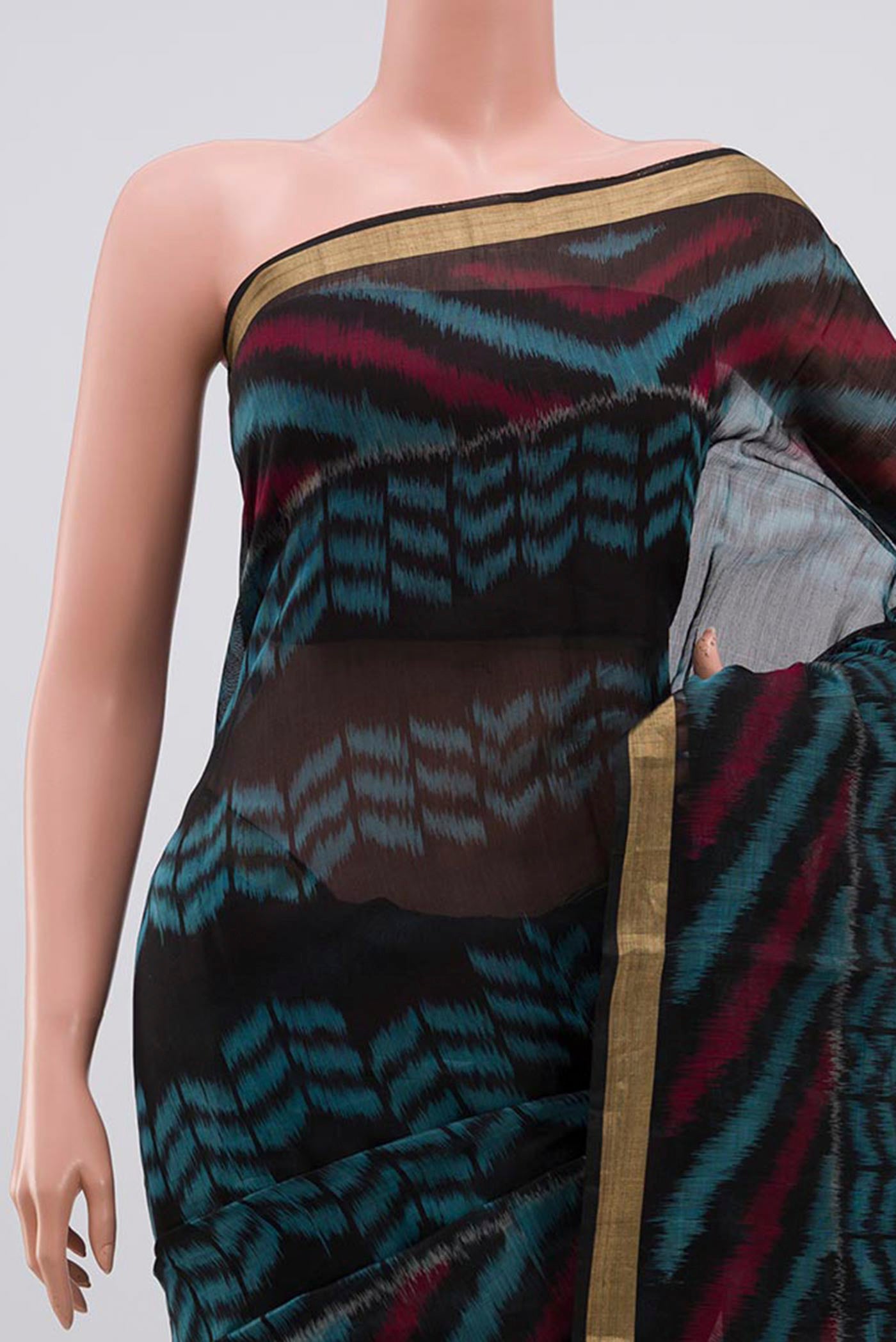 Border image of Black Coimbatore Silk Cotton Saree with Ikat Print on the body and Zari Border. 