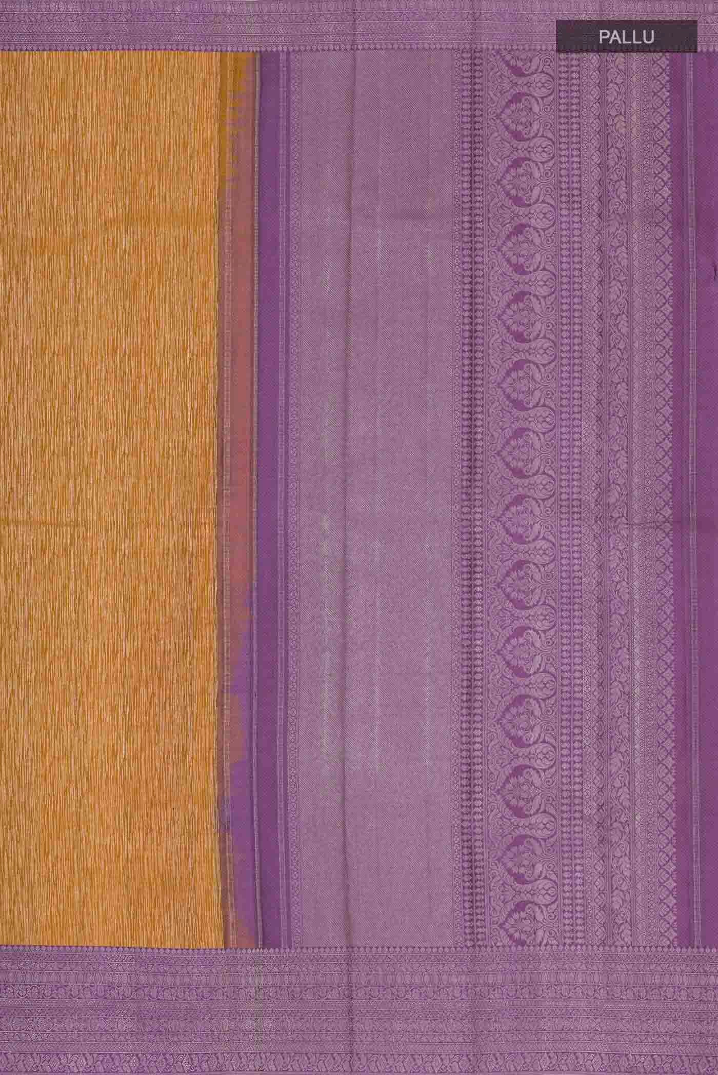 Close up image of the pallu of Mustard Kanchipuram Silk Saree with Zari Brocade on the body and Zari Border