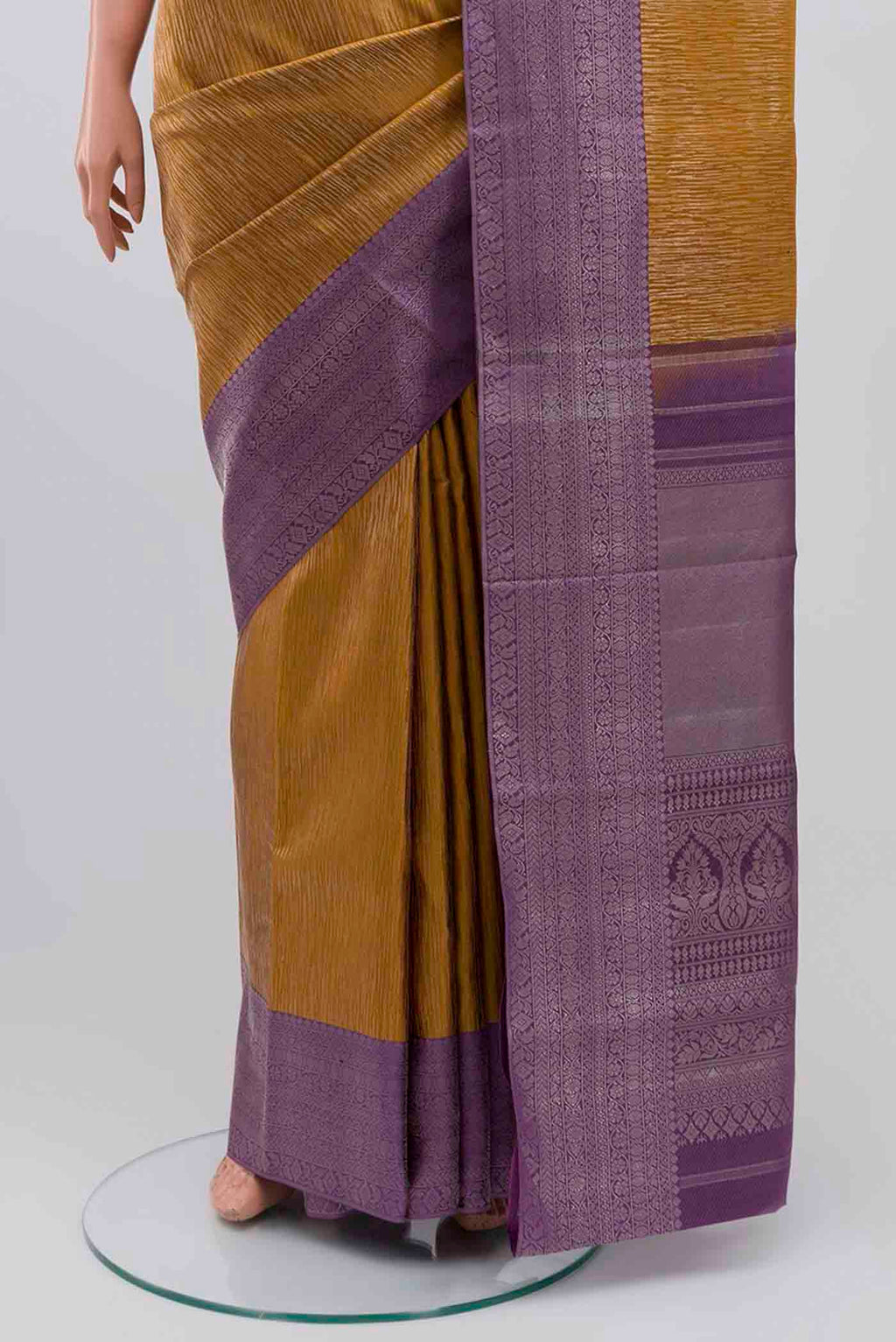 Pleats and pallu of Mustard Kanchipuram Silk Saree with Zari Brocade on the body and Zari Border