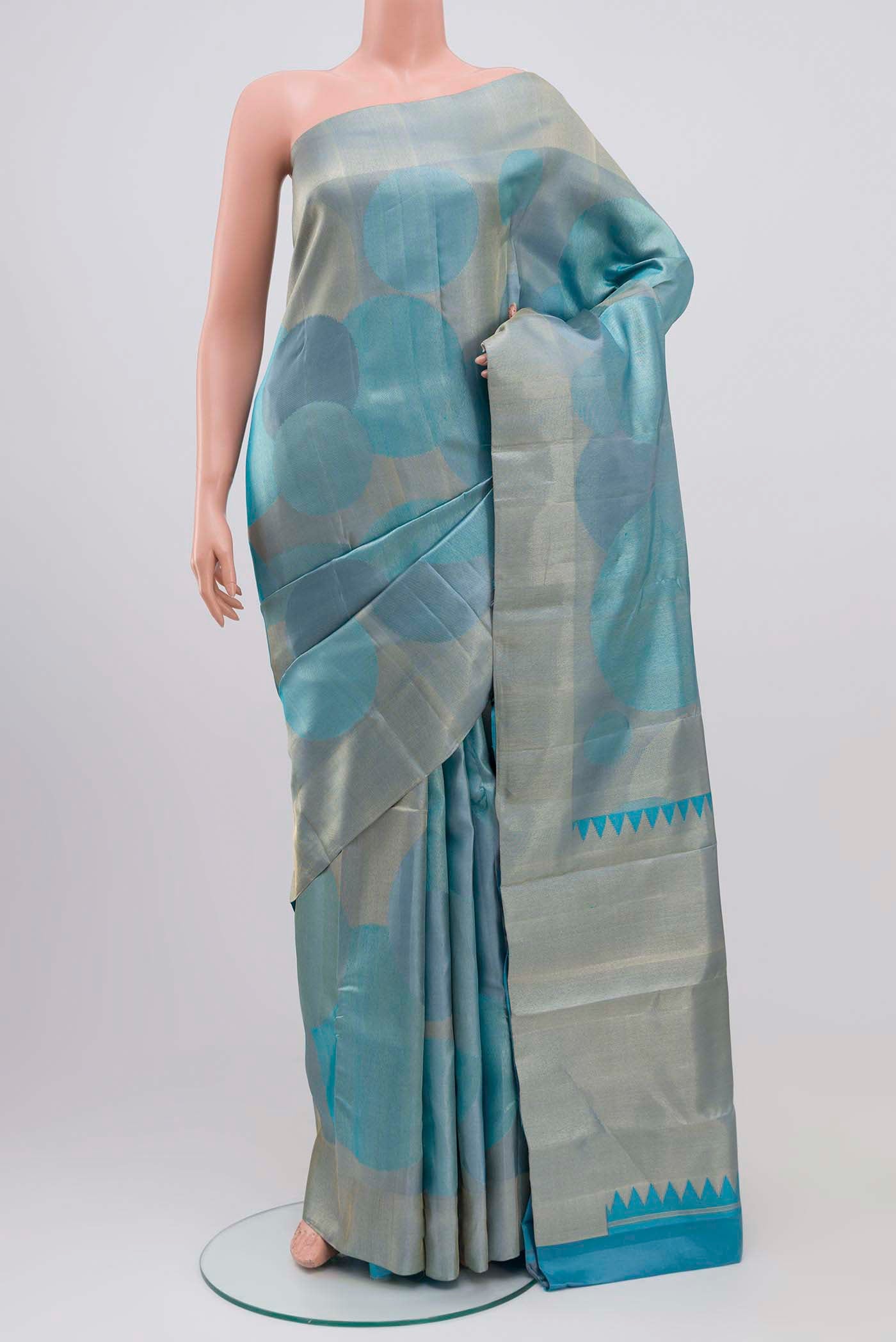 Sky Blue Kanchipuram Silk Saree with Zari Brocade on the body and Zari Border displayed on a mannequin