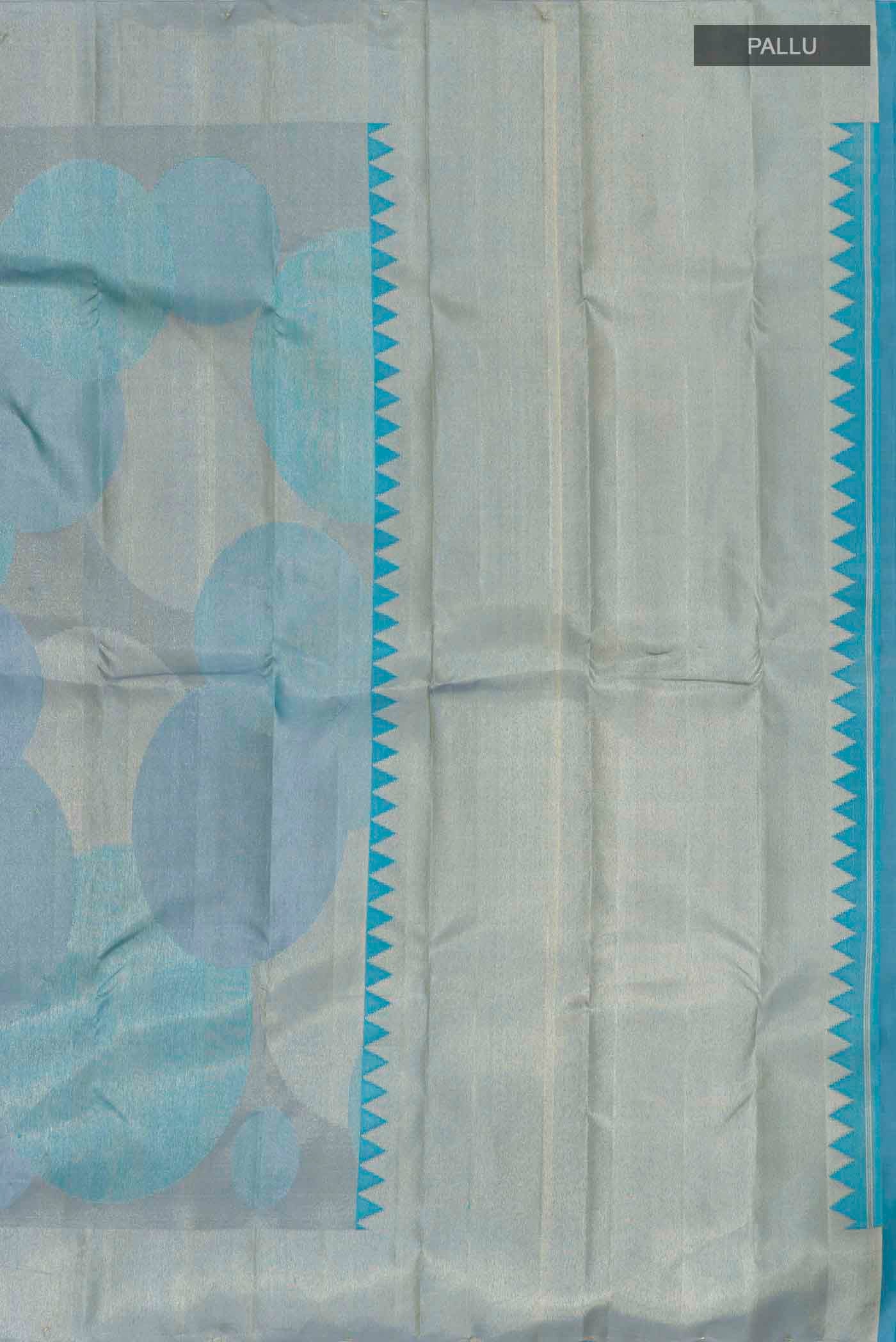 Close up image of the pallu of Sky Blue Kanchipuram Silk Saree with Zari Brocade on the body and Zari Border