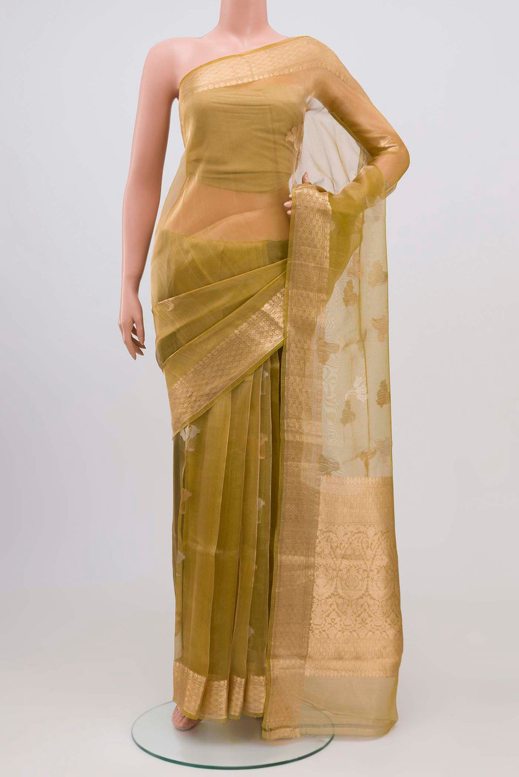 Golden Banarasi Tissue Silk Saree with Zari Butta on the body and Zari Border.  displayed on a mannequin