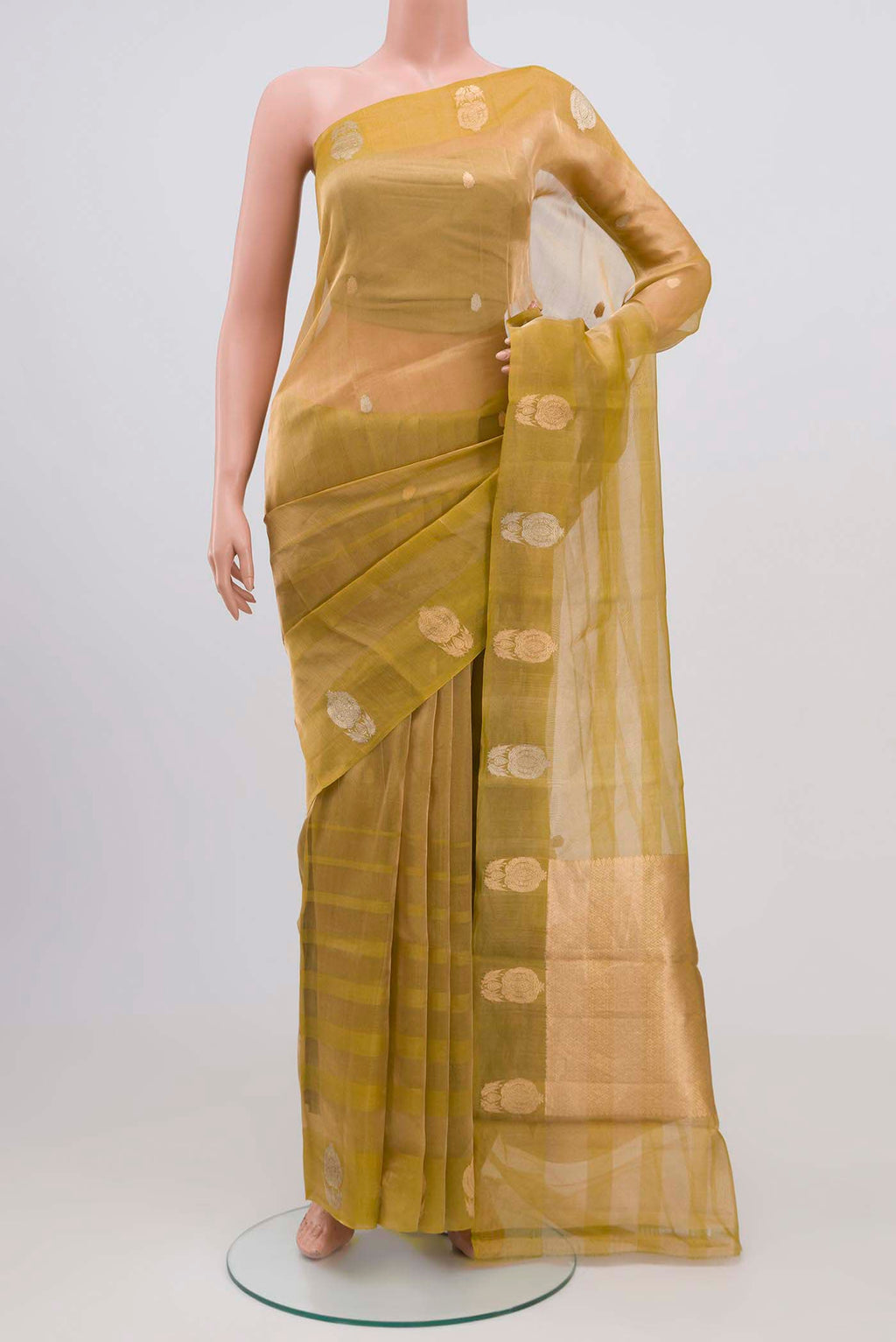 Golden Banarasi Tissue Silk Saree with Zari Butta on the body and Zari Border.  displayed on a mannequin